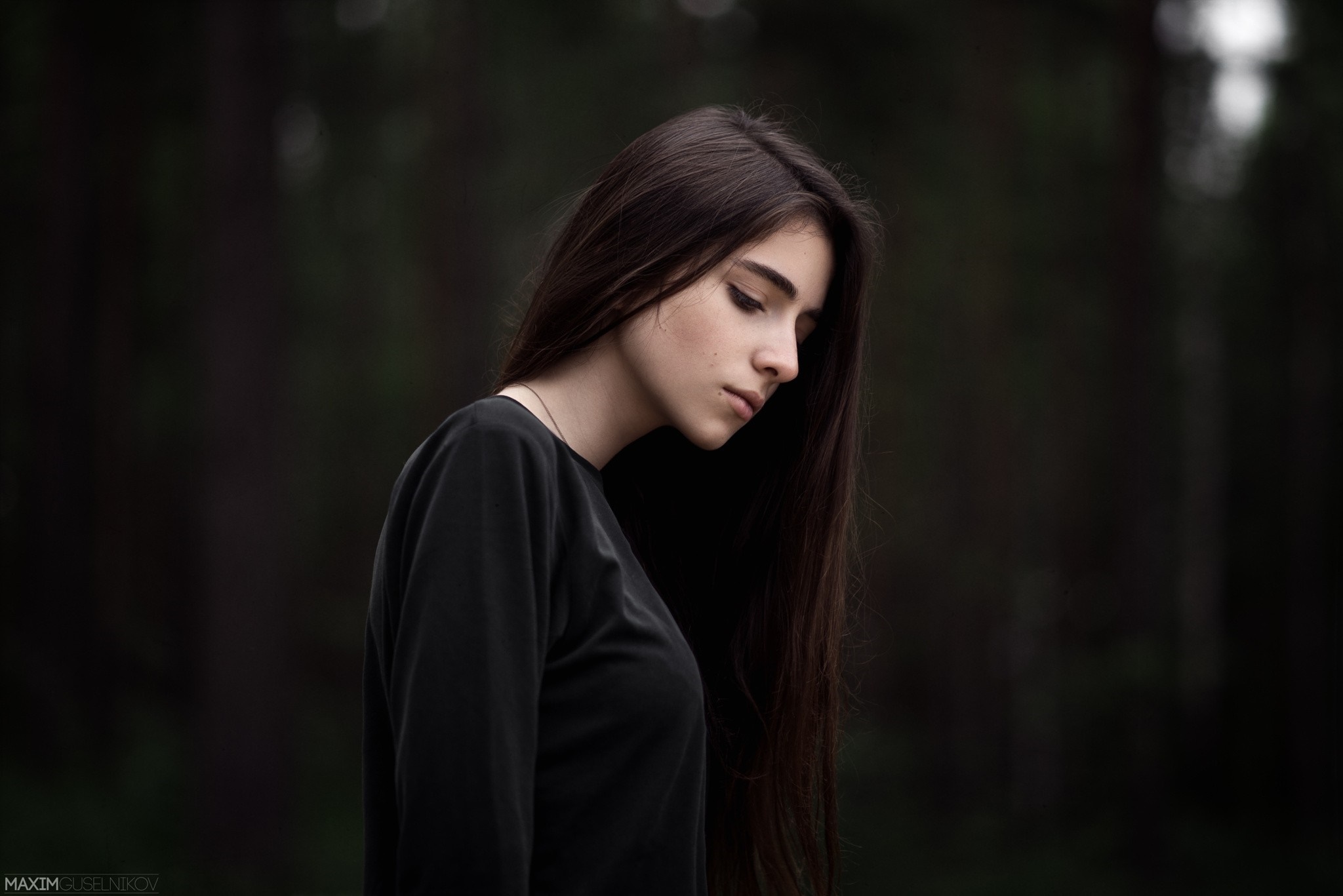 Woman with long brown hair in black shirt HD Wallpaper