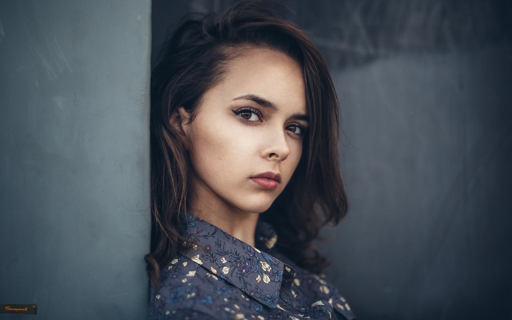 Woman with brown hair in a floral shirt HD Wallpaper