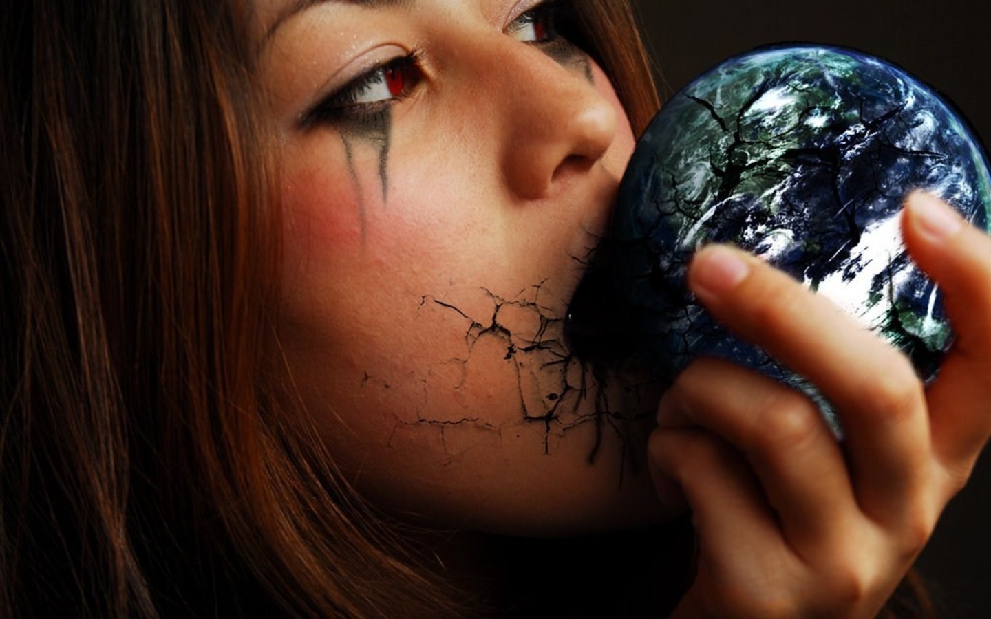 Woman with cracked face holding broken Earth HD Wallpaper