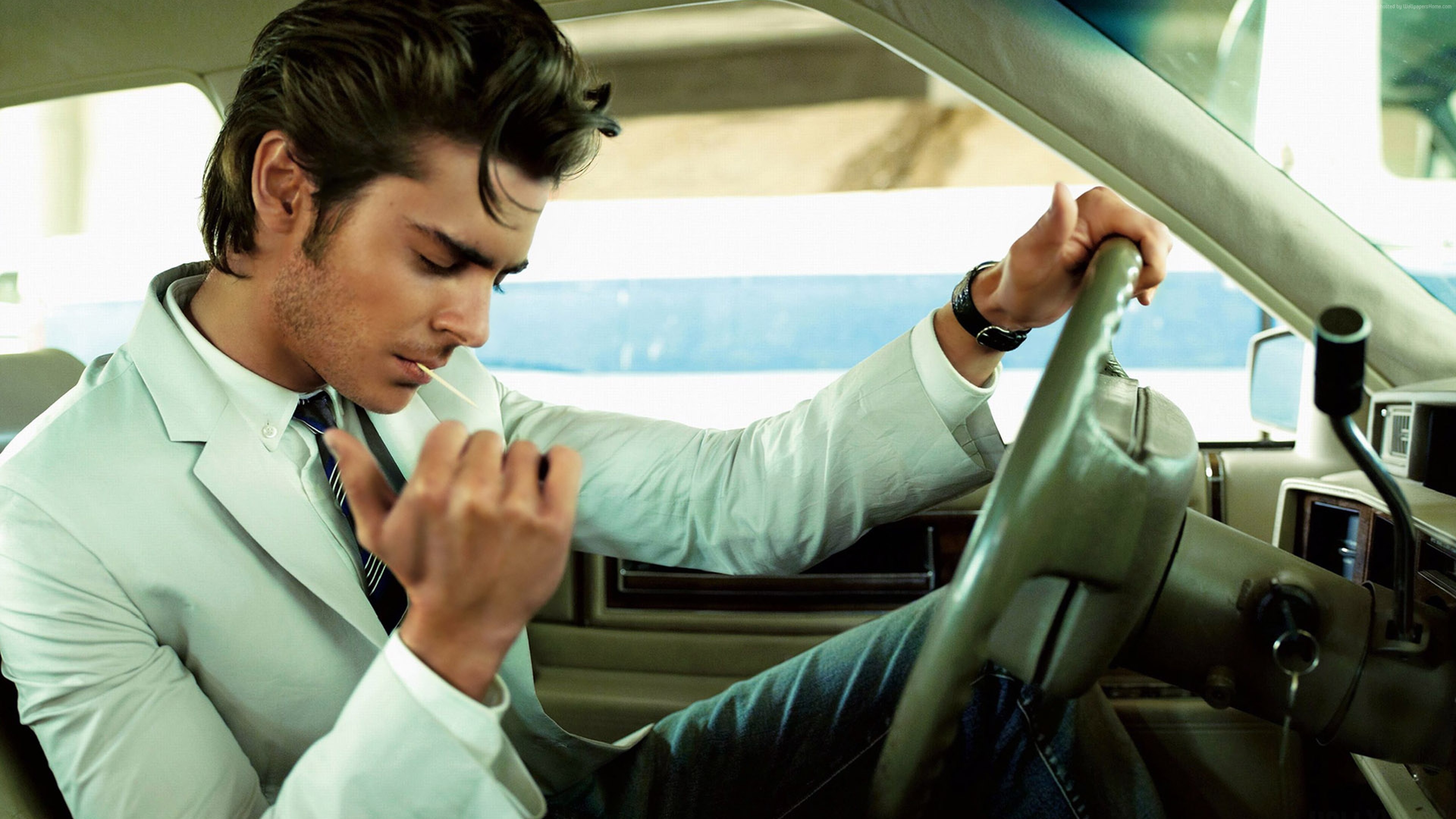 Zac Efron in a car HD Wallpaper