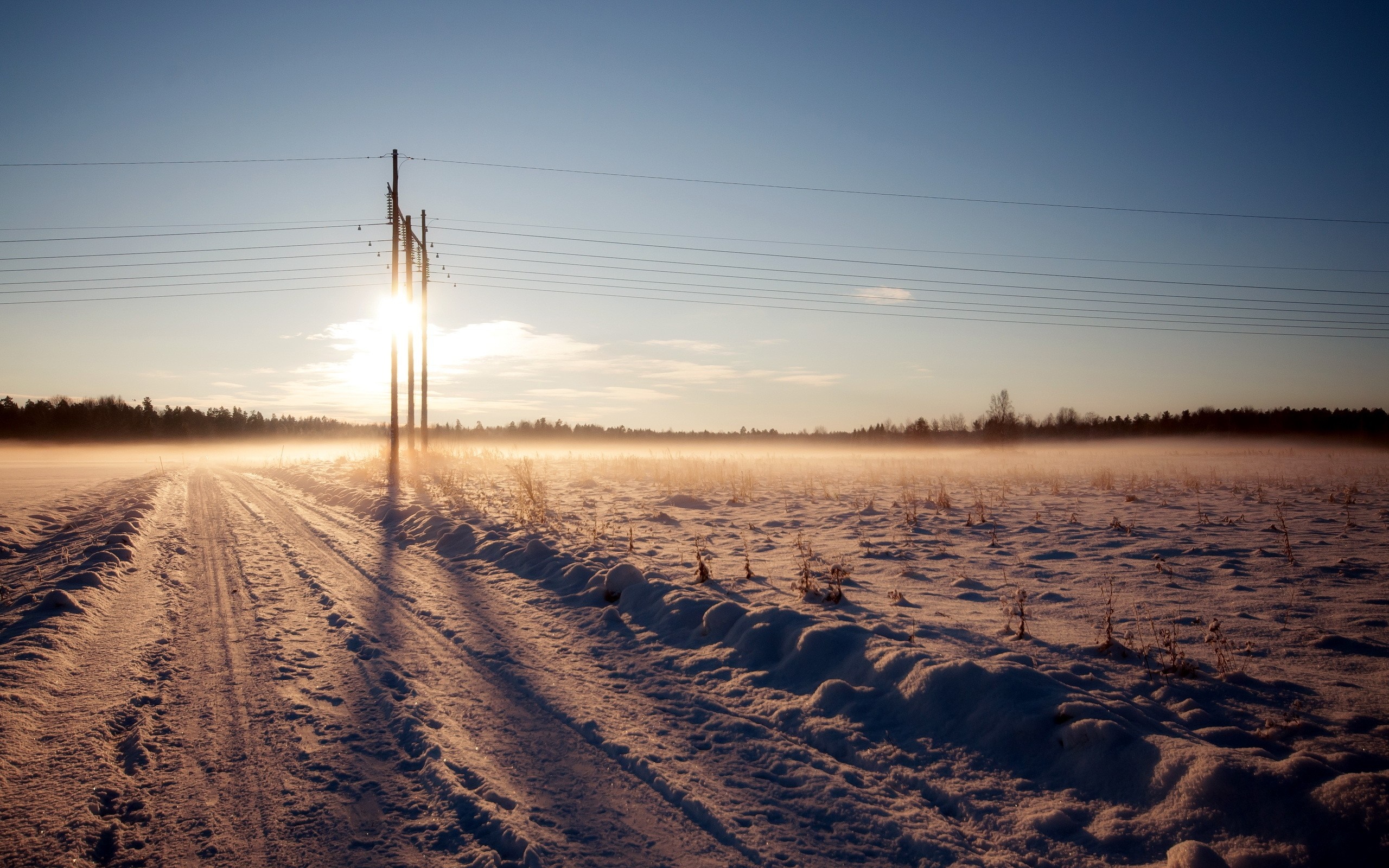 Winter field with power lines at sunrise HD Wallpaper
