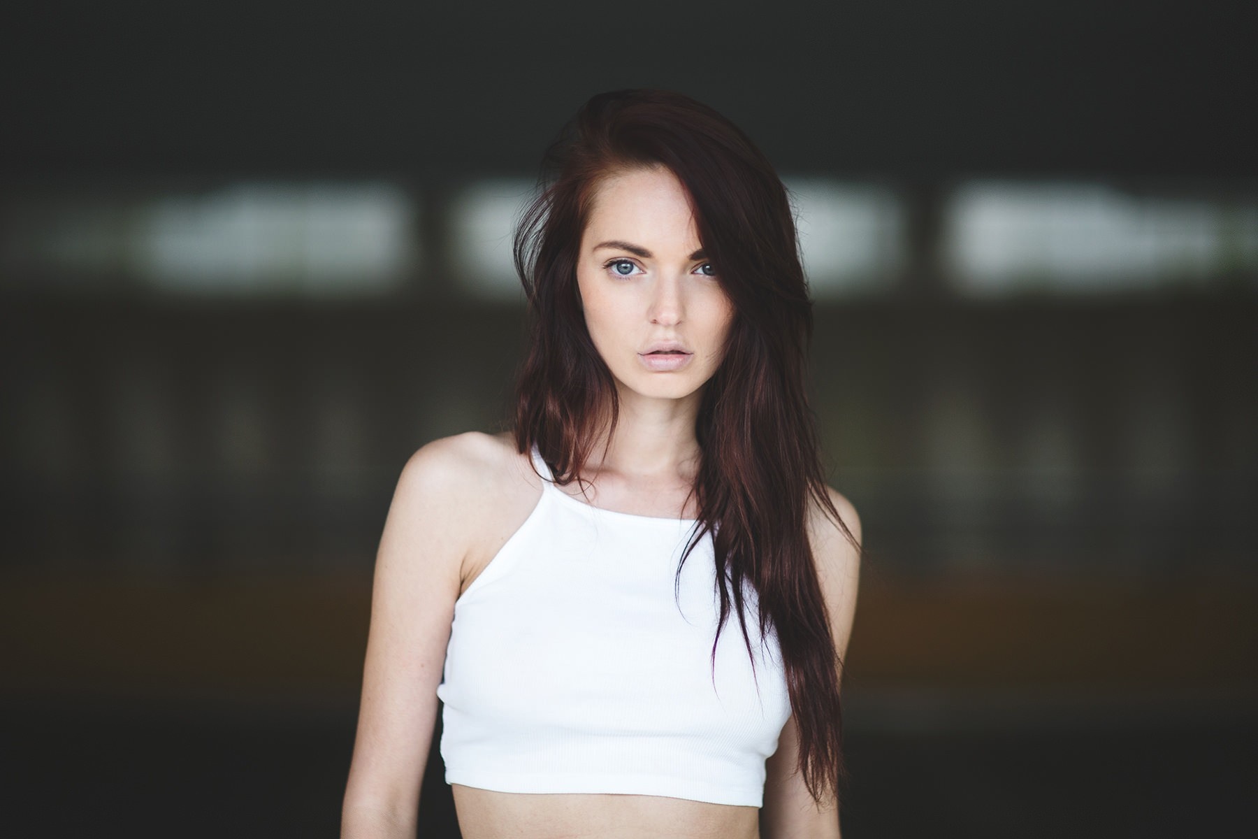 Woman with long brown hair wearing a white crop top HD Wallpaper