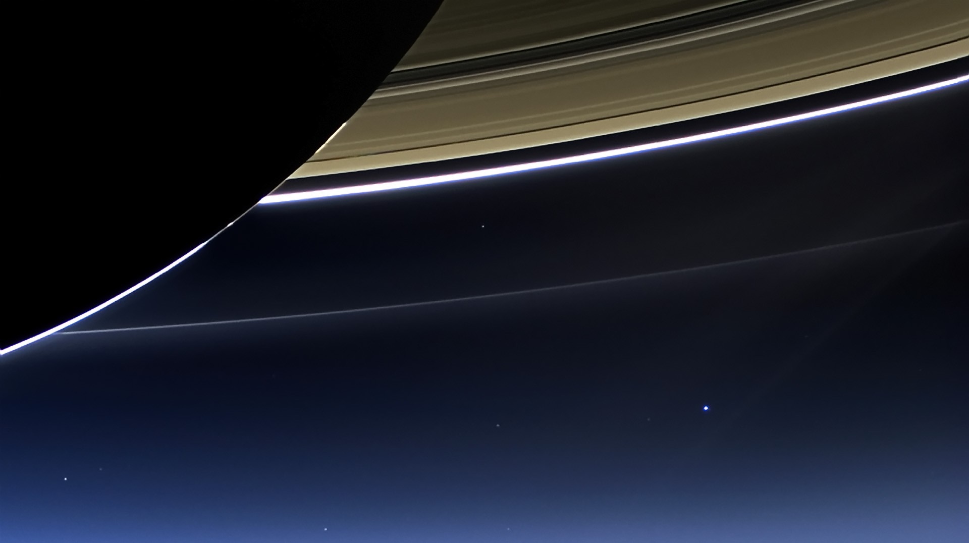 Saturn's rings and moons from space HD Wallpaper