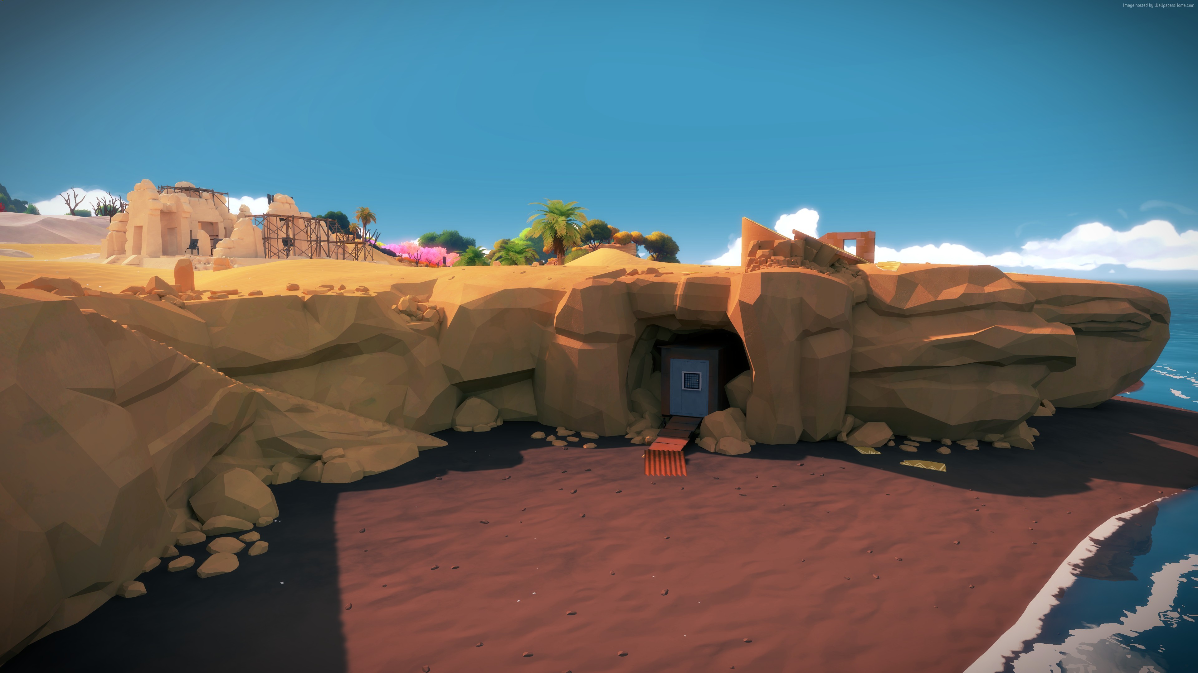 The Witness puzzle cave entrance on a beach HD Wallpaper