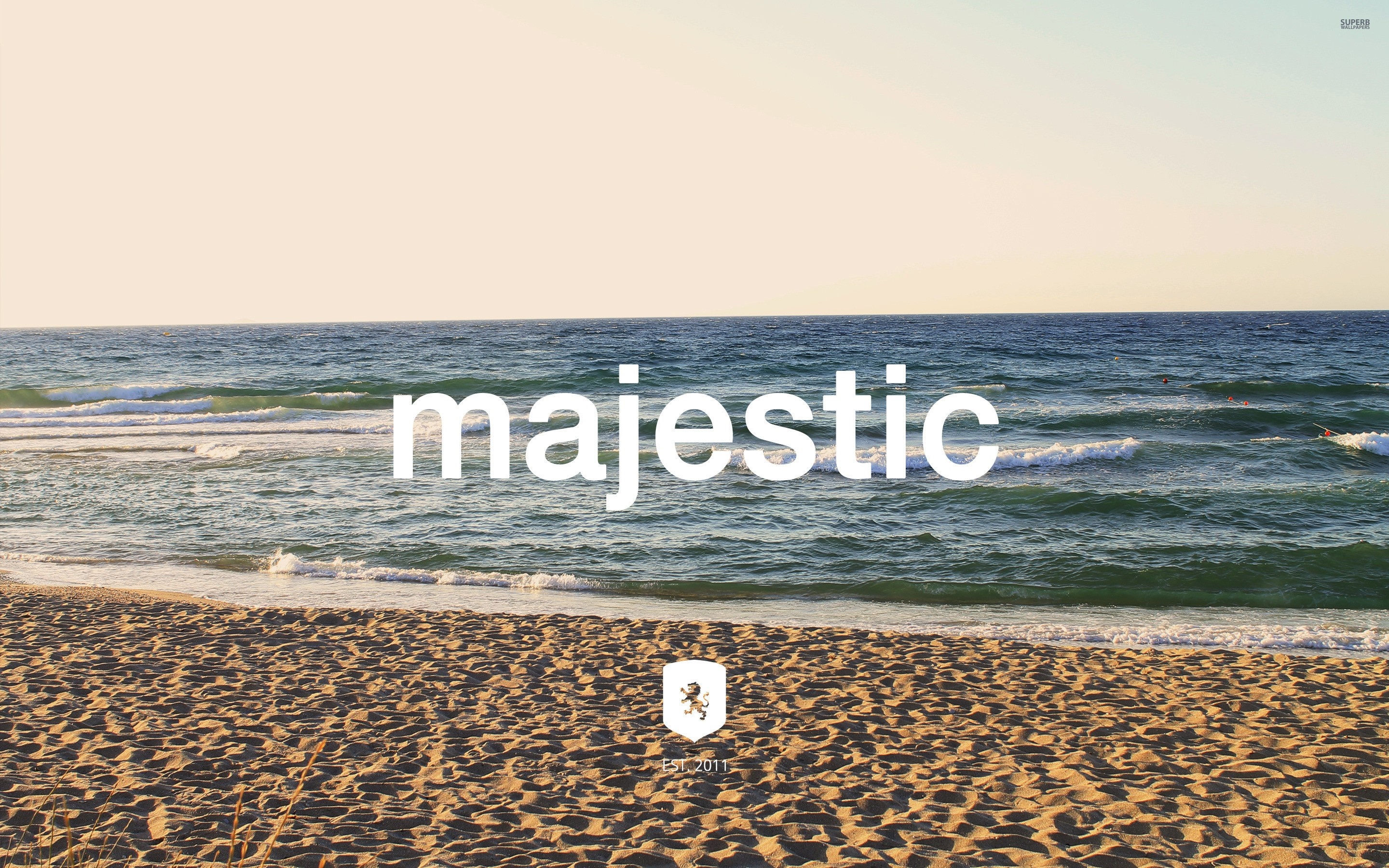 Majestic beach with ocean waves and sand HD Wallpaper
