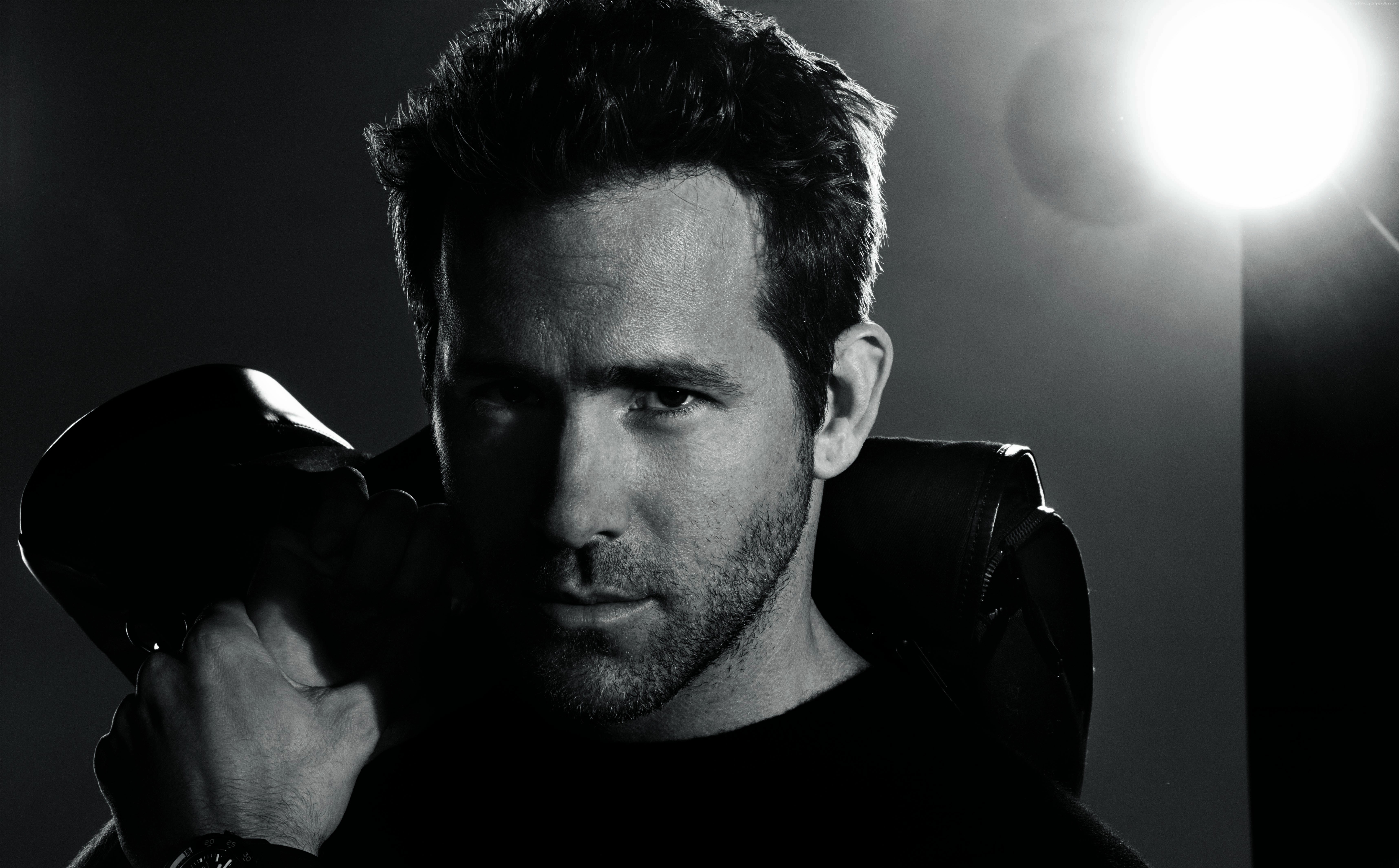 Ryan Reynolds holding a kettlebell HD Wallpaper