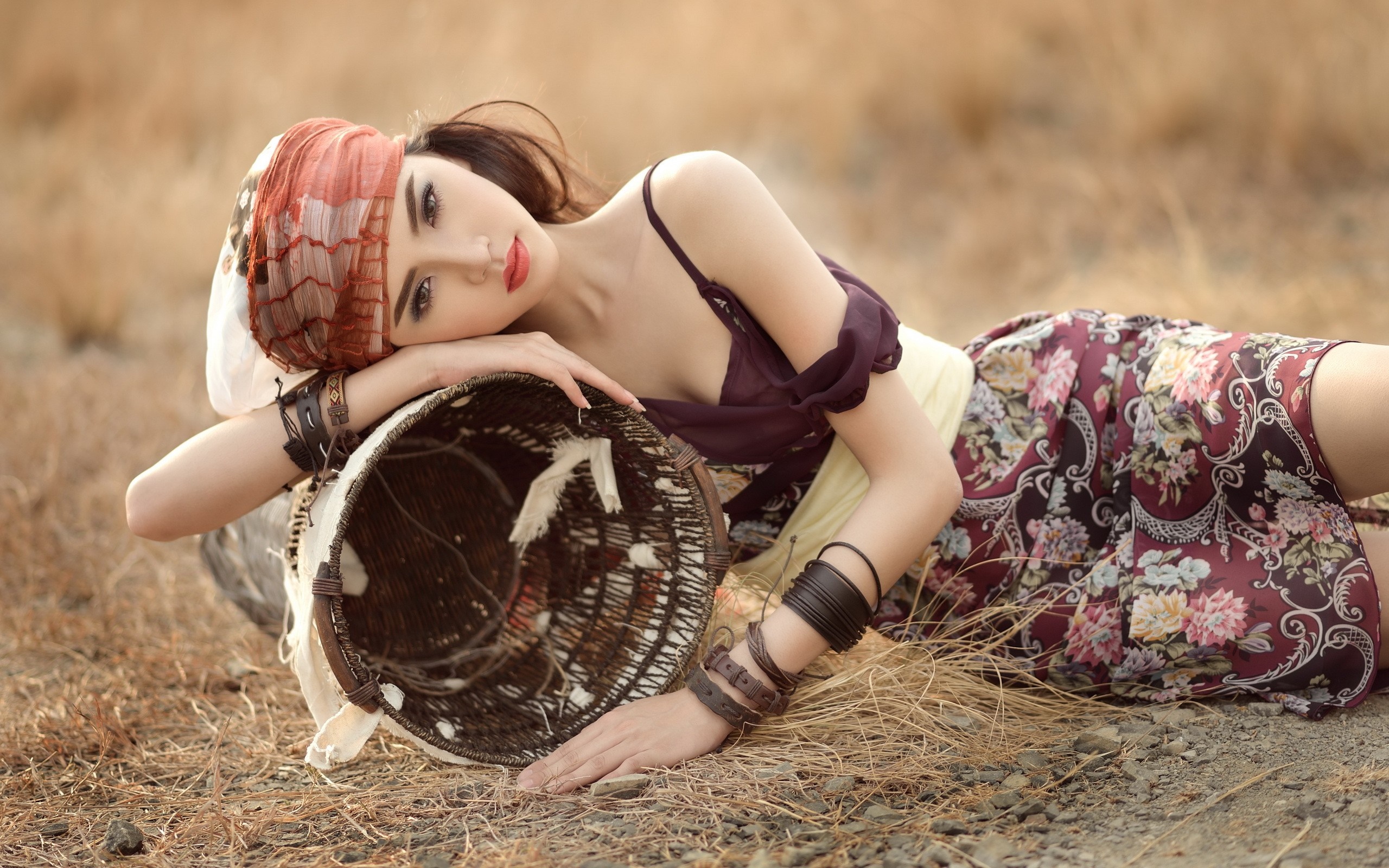 Elegant Woman with Basket in Outdoor Setting HD Wallpaper