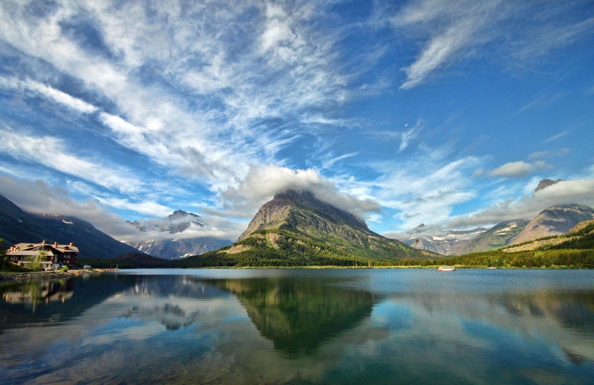 Lake McDonald with mountains and clouds HD Wallpaper