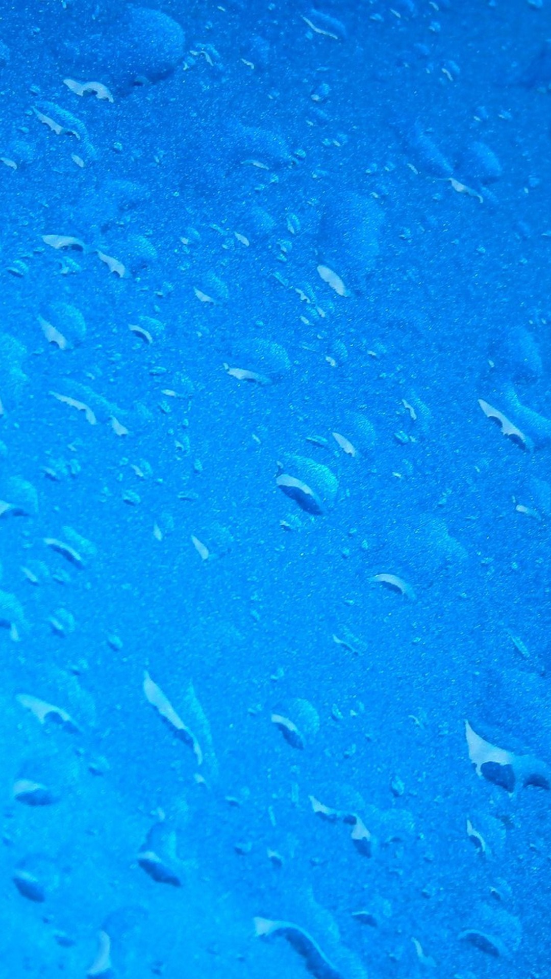 Blue surface with water droplets HD Wallpaper