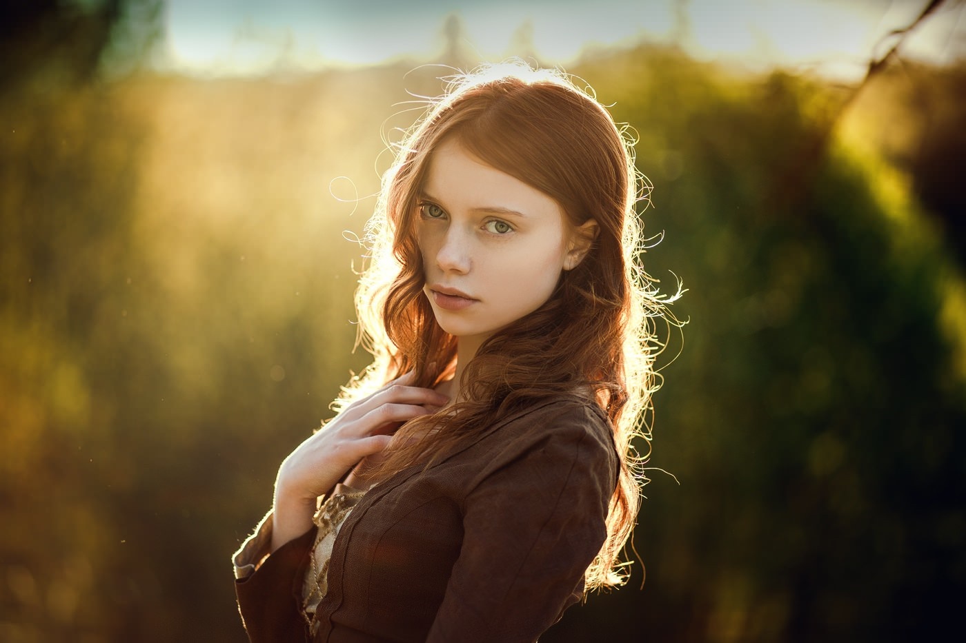 Young woman with red hair in sunlight HD Wallpaper
