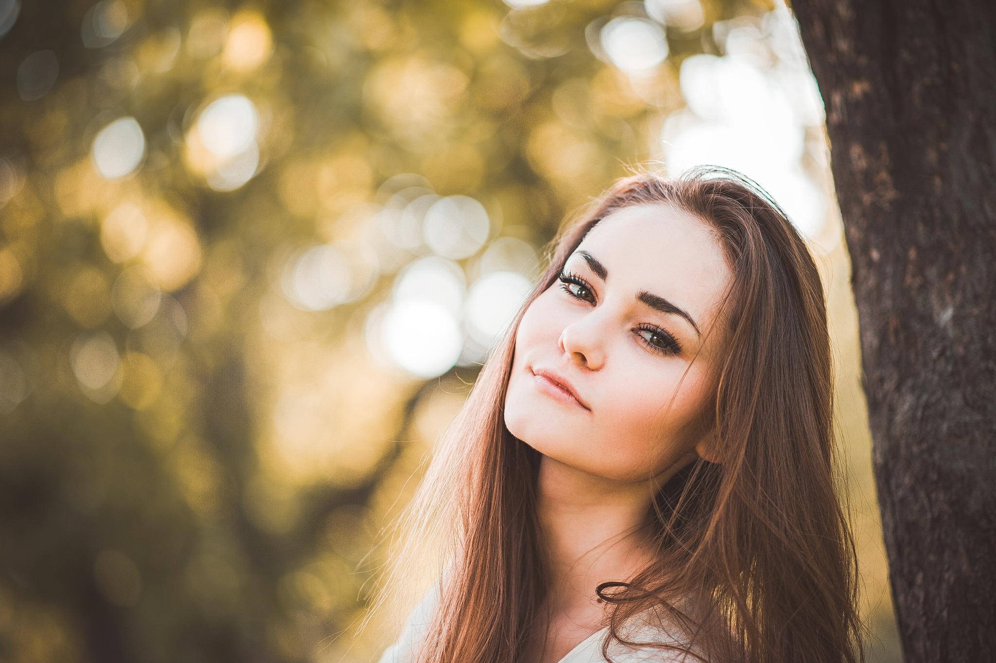Woman with long brown hair outdoors HD Wallpaper