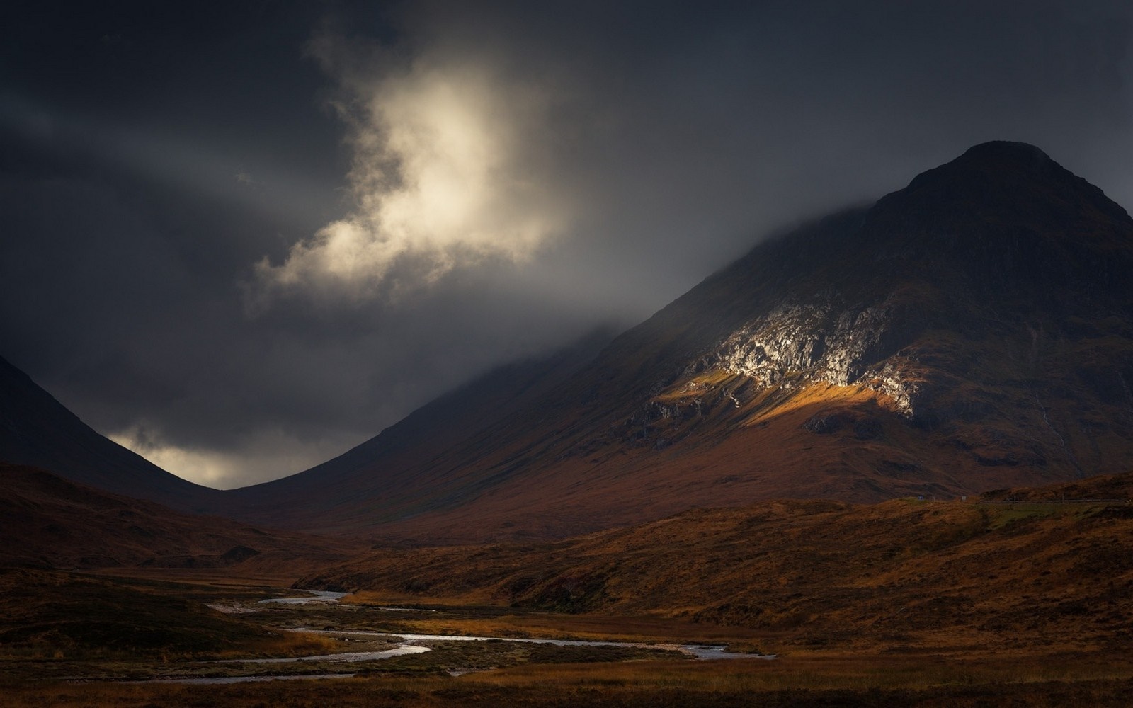 Sunlight Breaking Through Clouds on Mountain Landscape HD Wallpaper