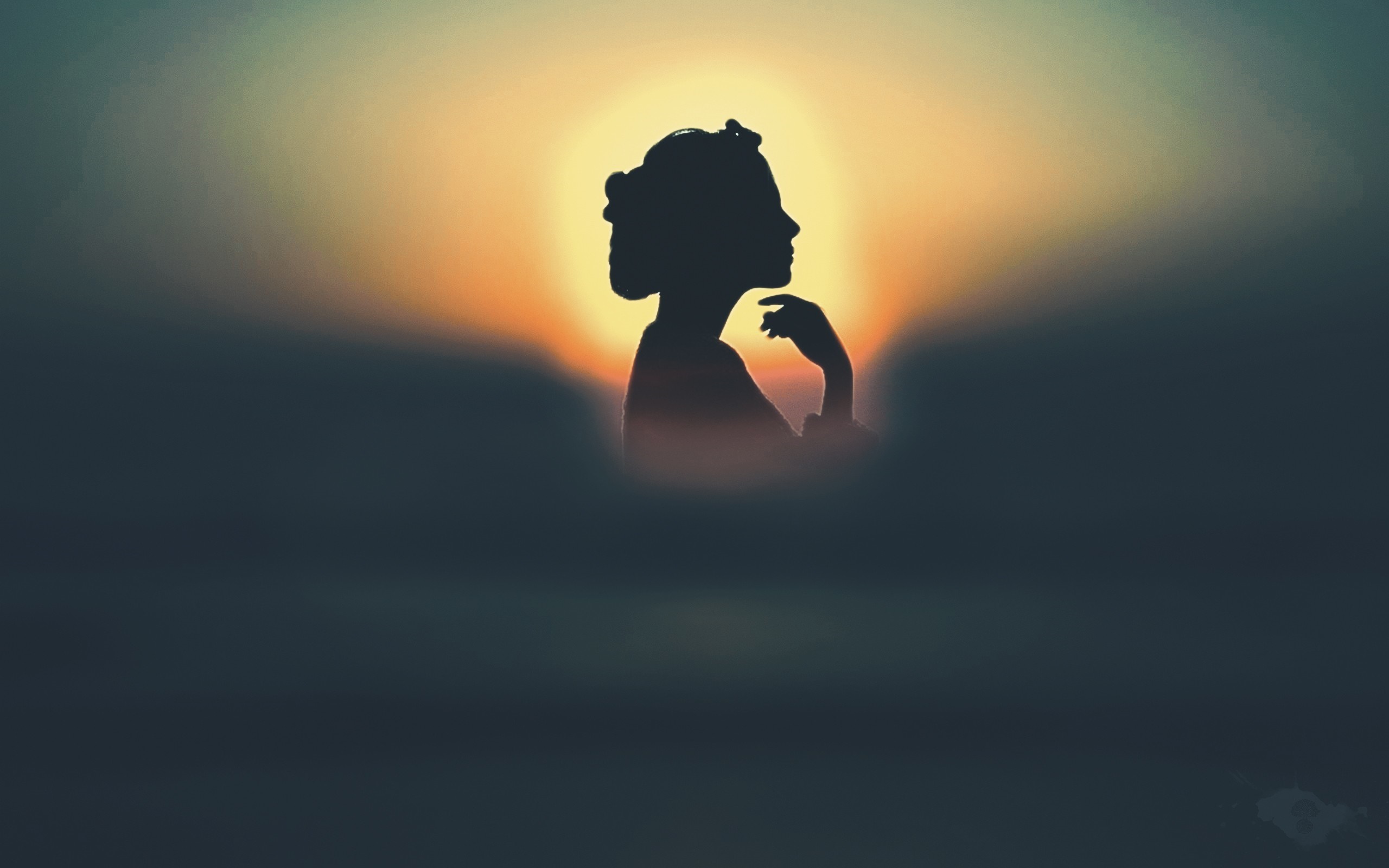 Silhouette of a woman against a sunset HD Wallpaper