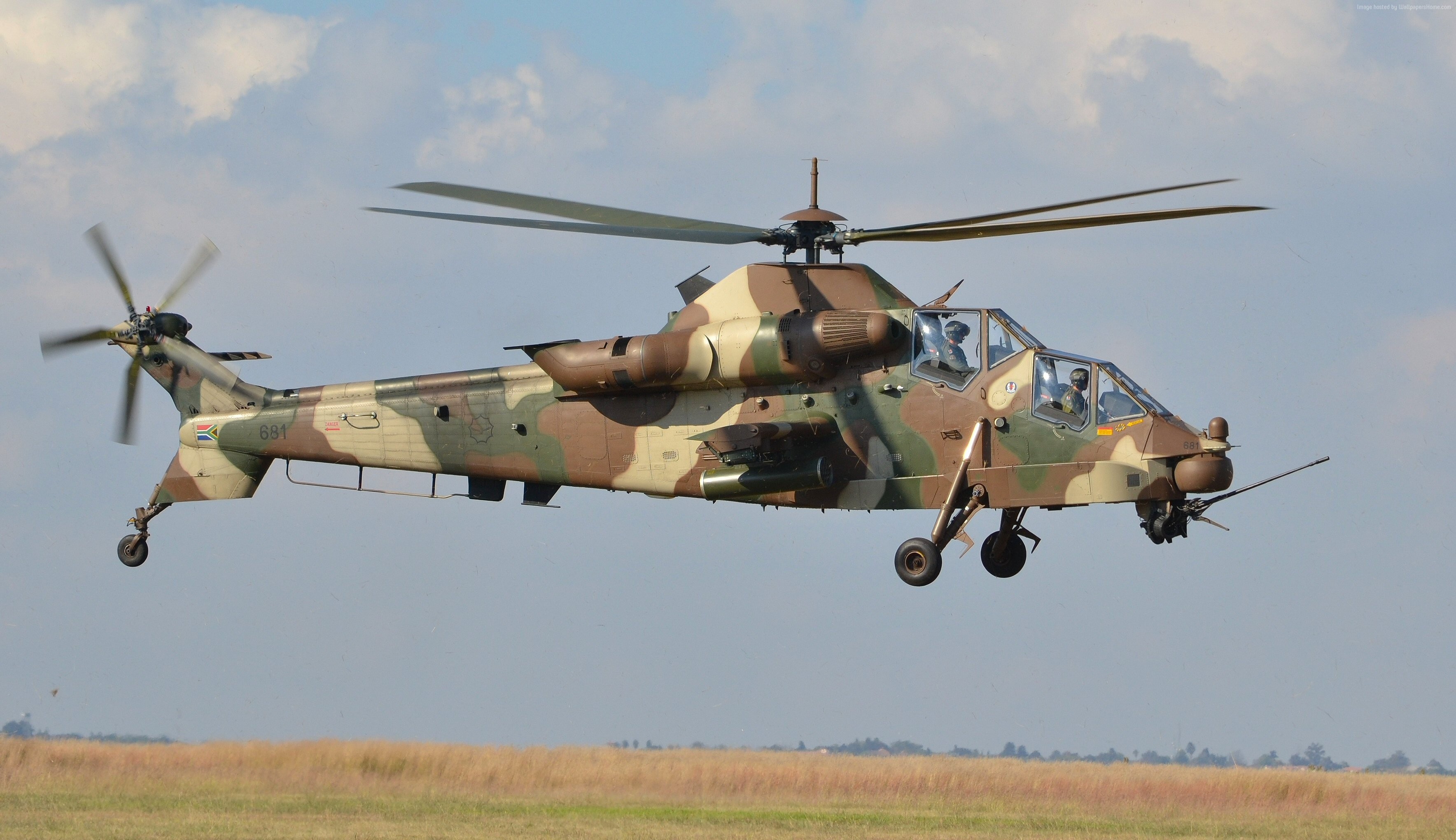 Denel AH-2 Rooivalk attack helicopter in flight HD Wallpaper