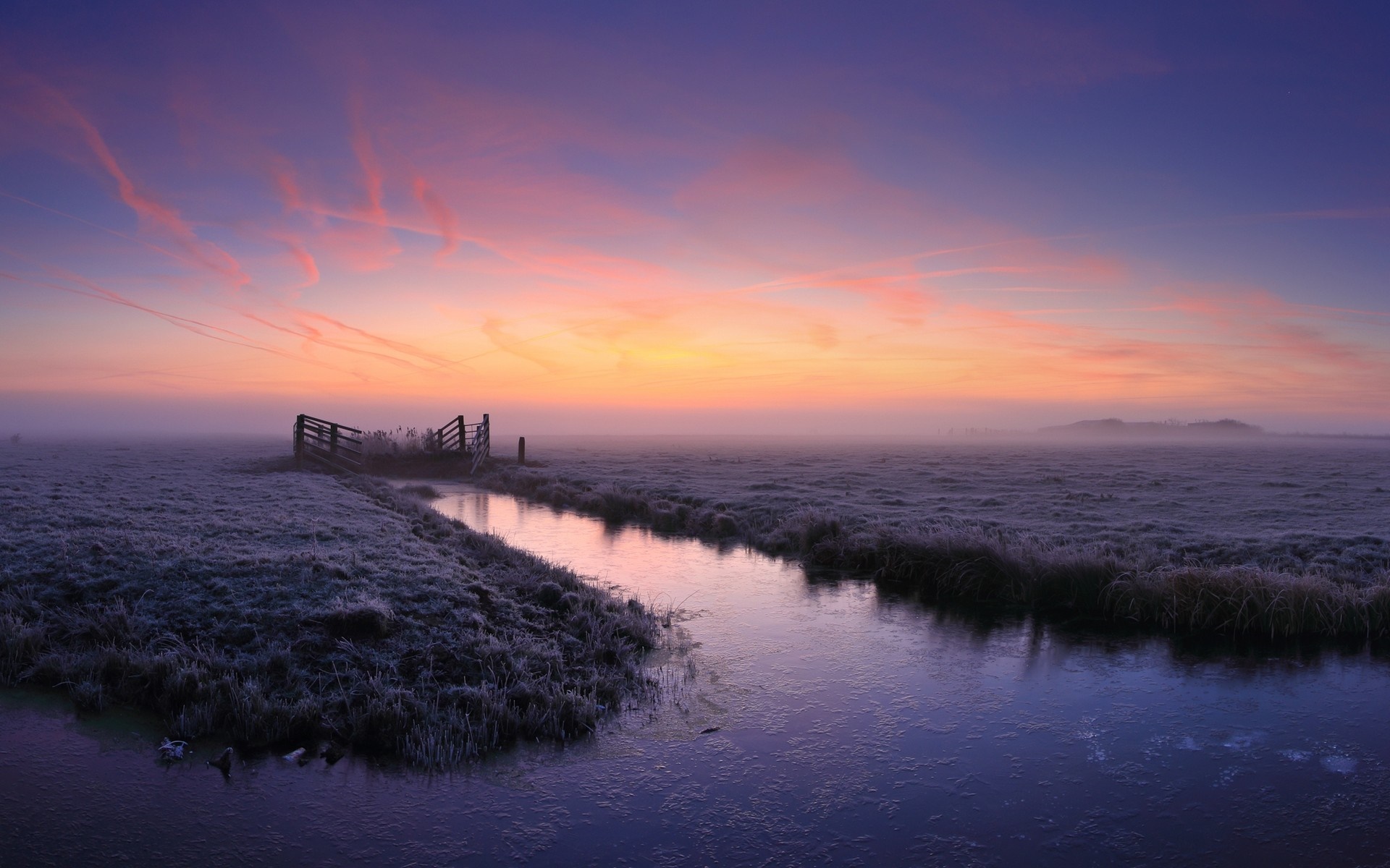 Frosty field with a canal at sunrise HD Wallpaper