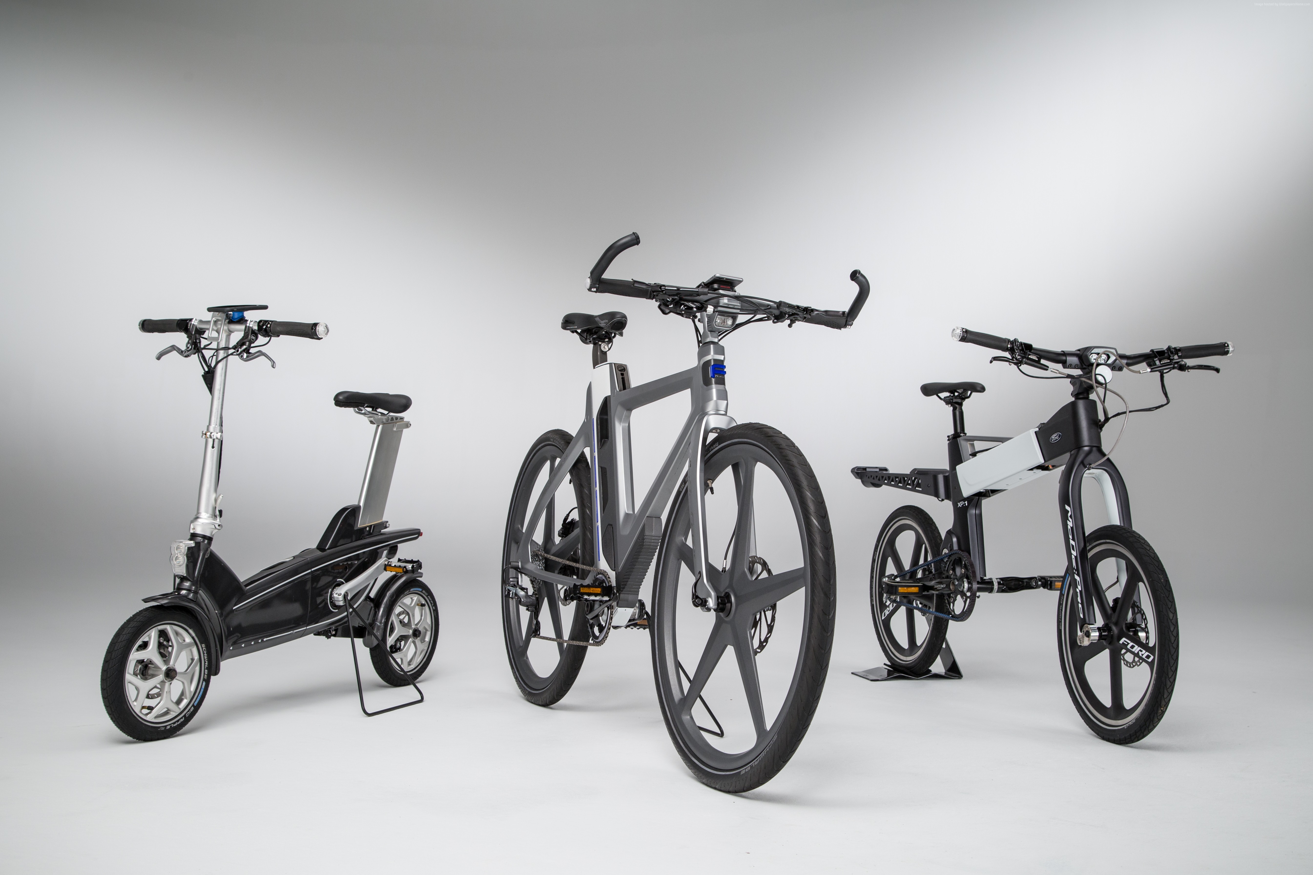 Three electric bicycles and scooters by Ford HD Wallpaper