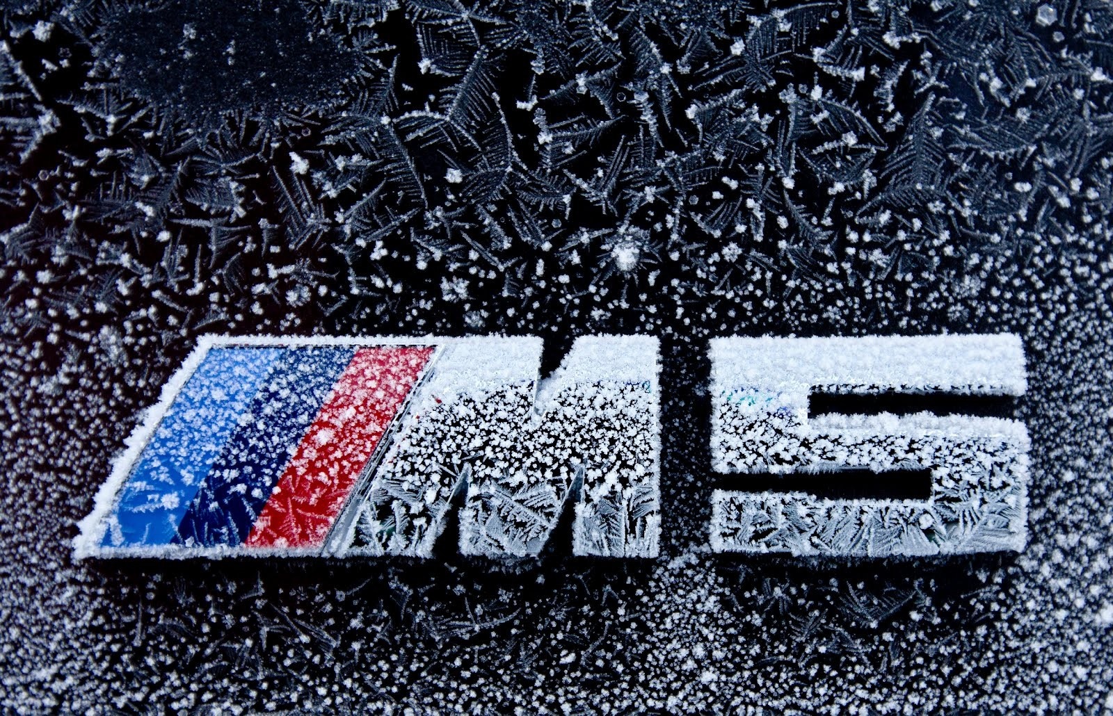 BMW M5 logo covered in frost HD Wallpaper