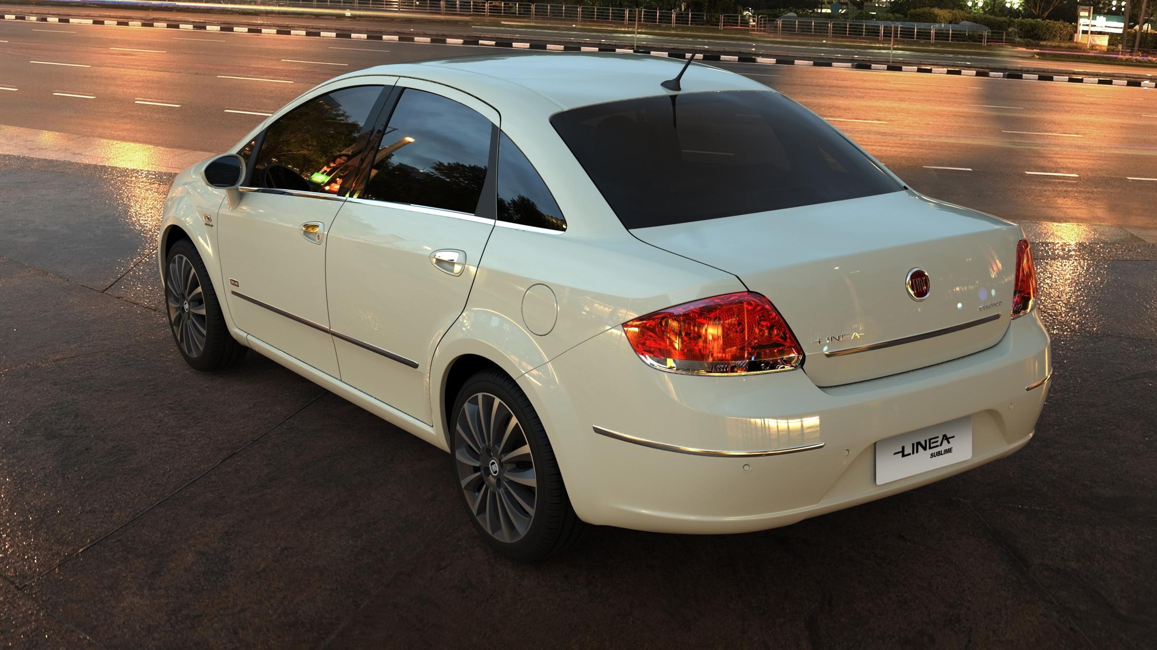 White Fiat Linea sedan parked on wet asphalt road HD Wallpaper