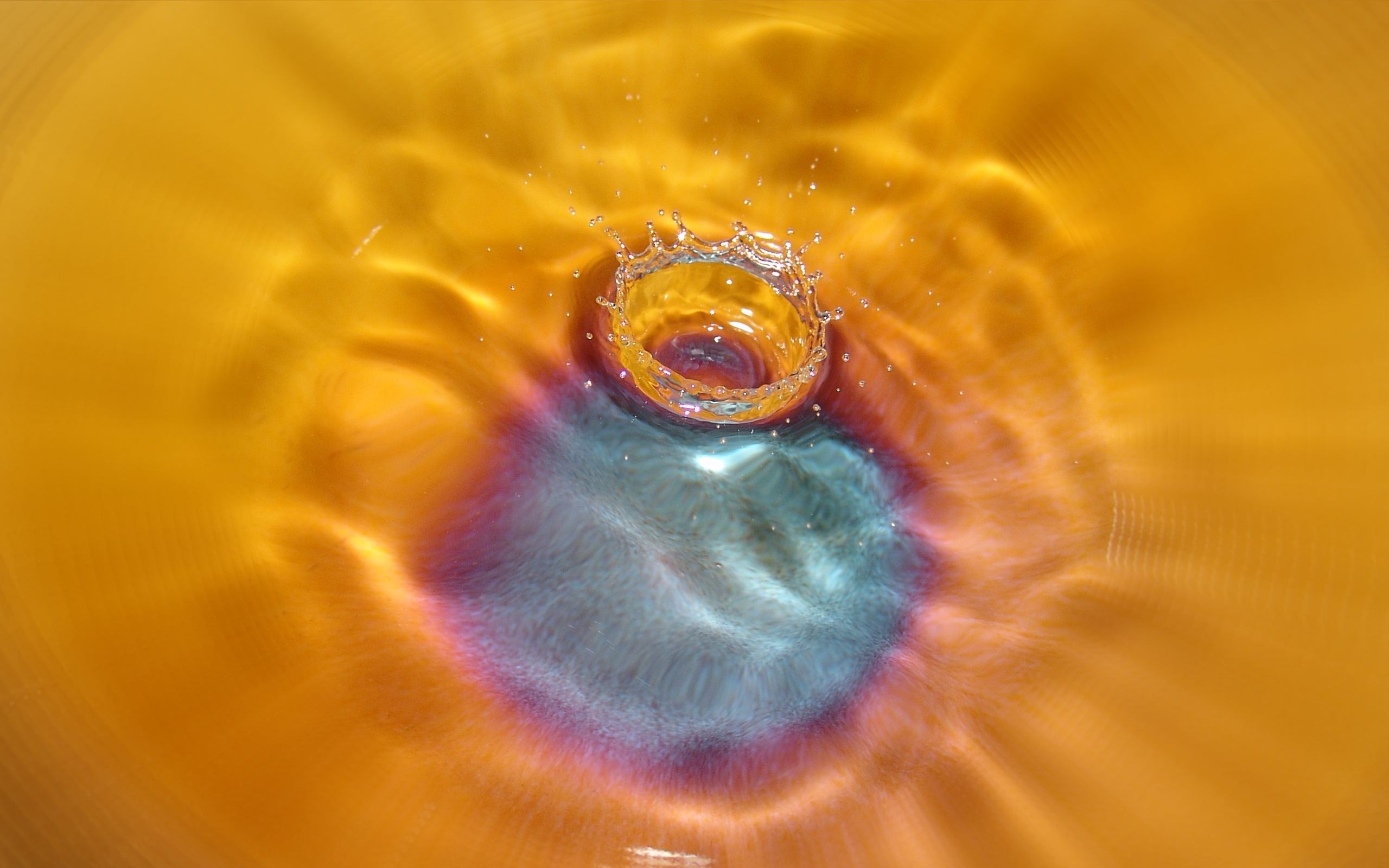Water splash with colorful ripples HD Wallpaper
