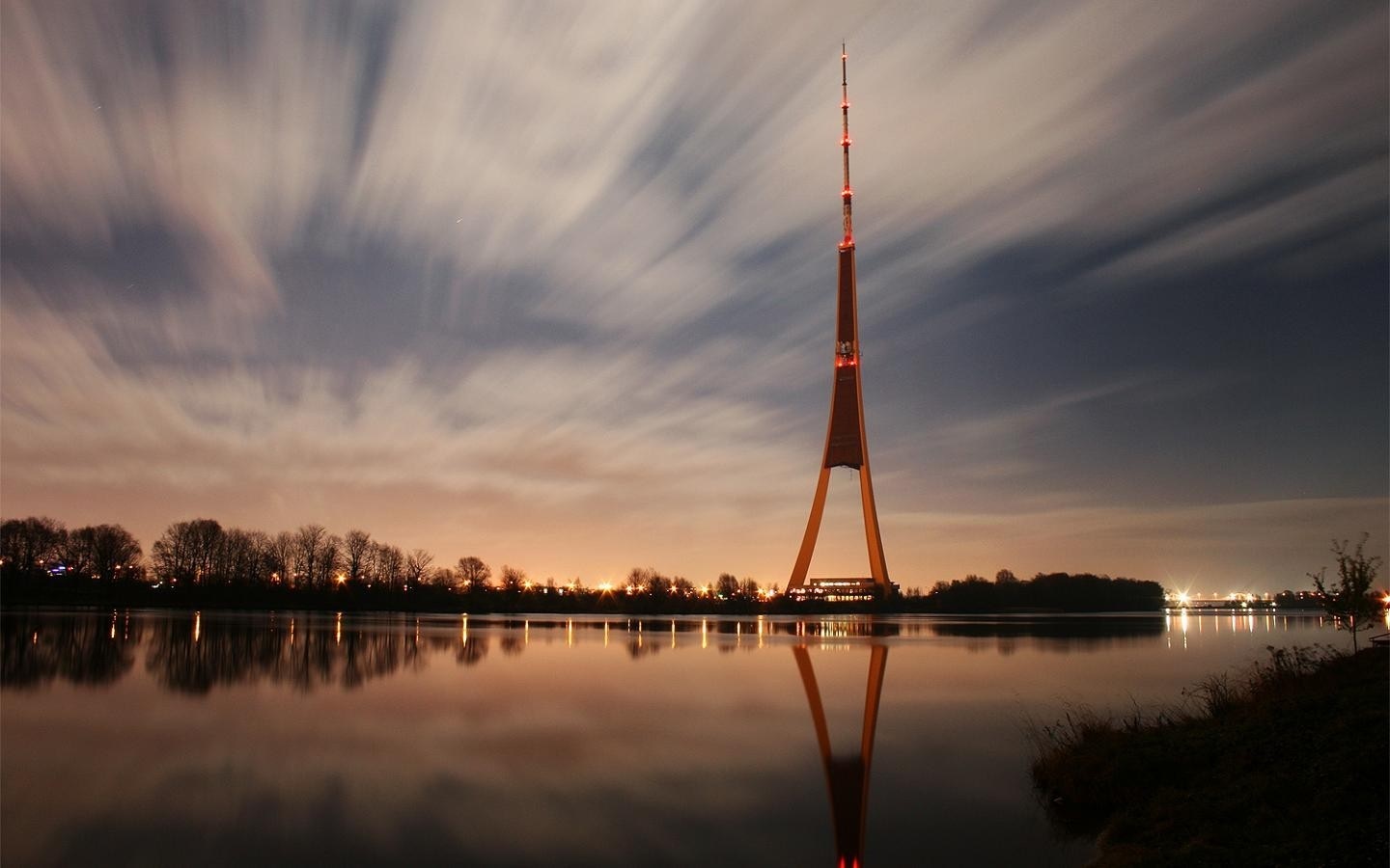 Riga TV Tower reflected in a river at night HD Wallpaper