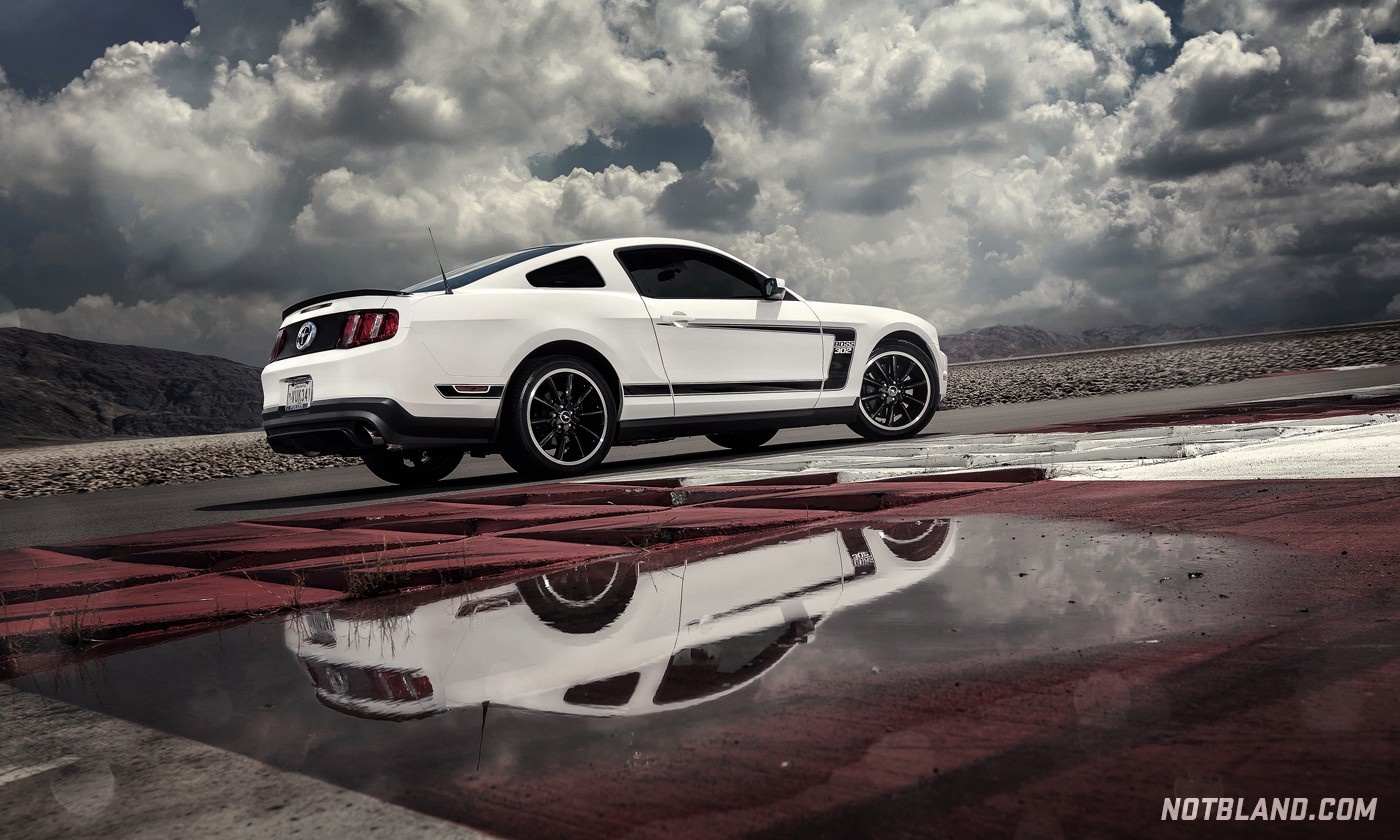White Ford Mustang Boss 302 on a wet track HD Wallpaper