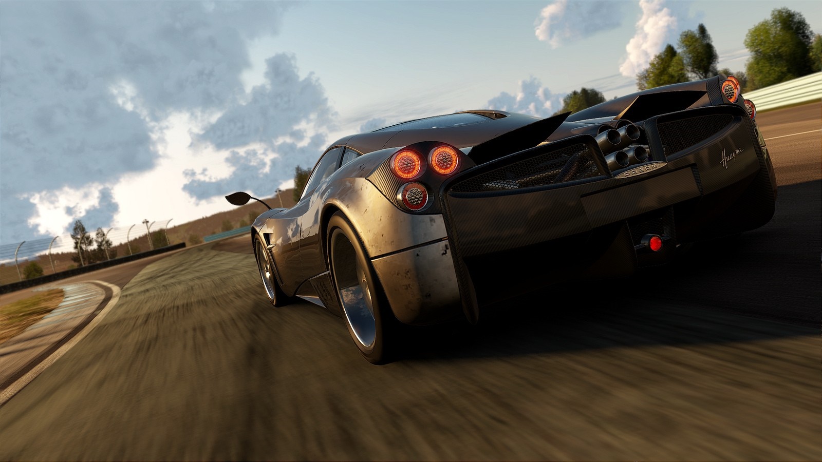 Pagani Huayra sports car on a race track HD Wallpaper