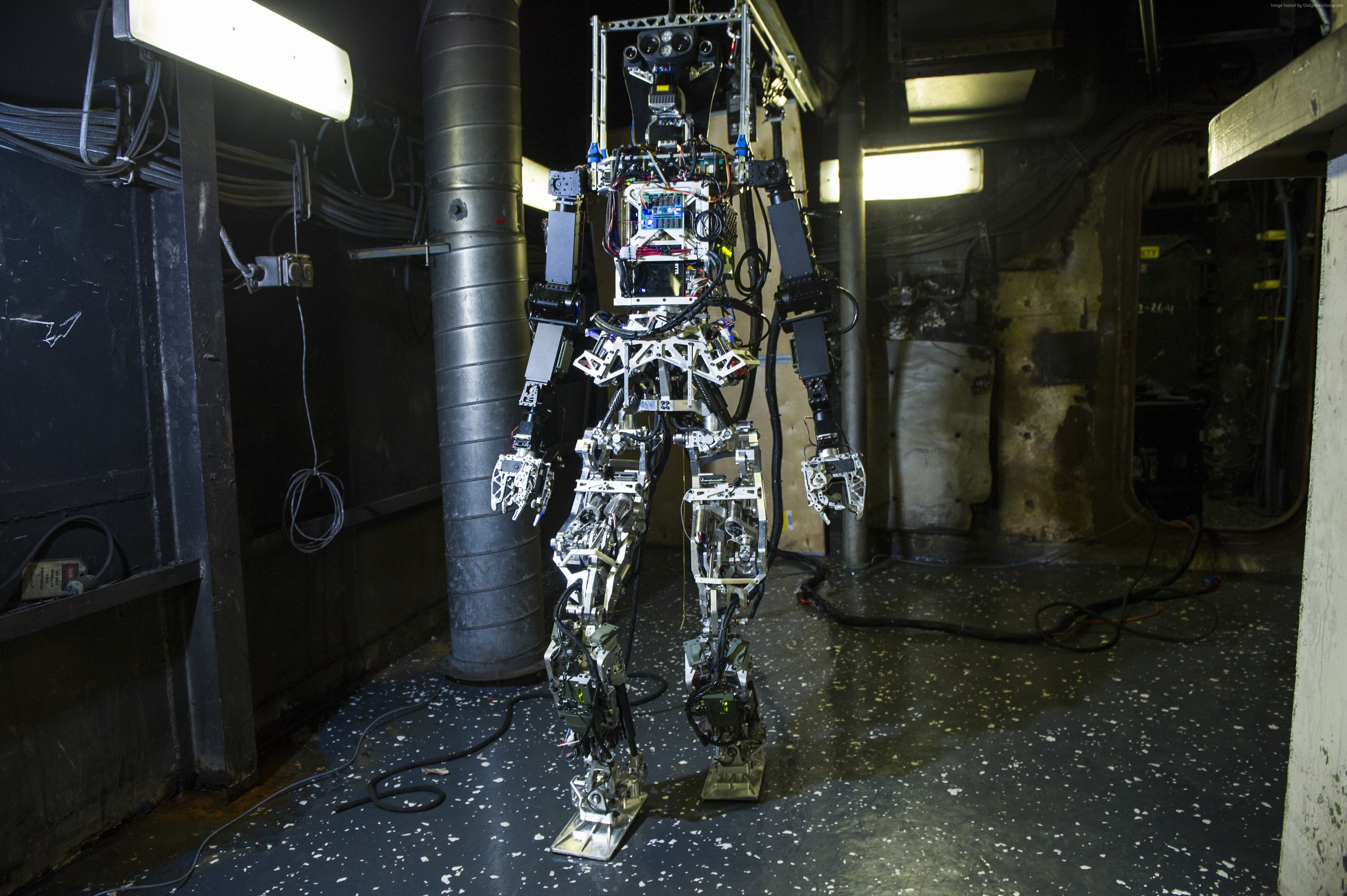 Saffir robot in a dark industrial setting HD Wallpaper