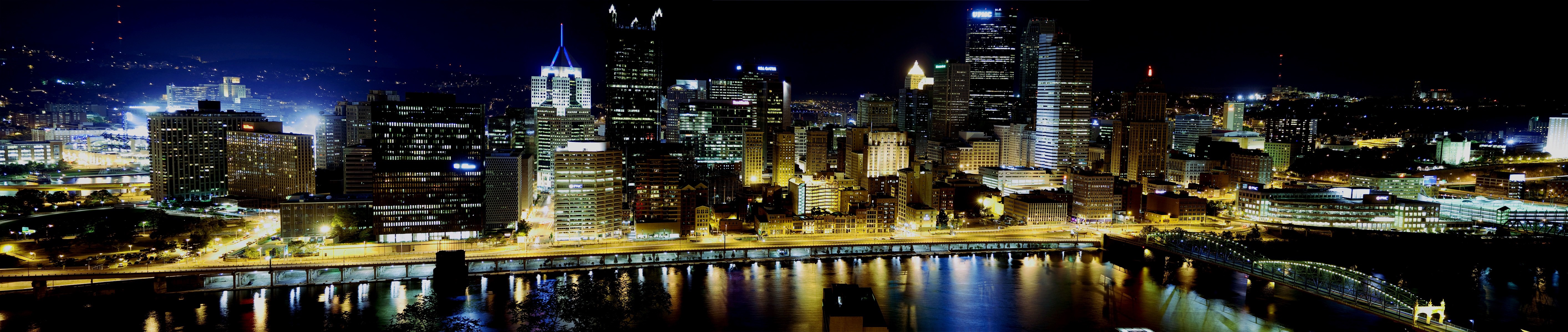 Pittsburgh skyline at night with river reflections HD Wallpaper