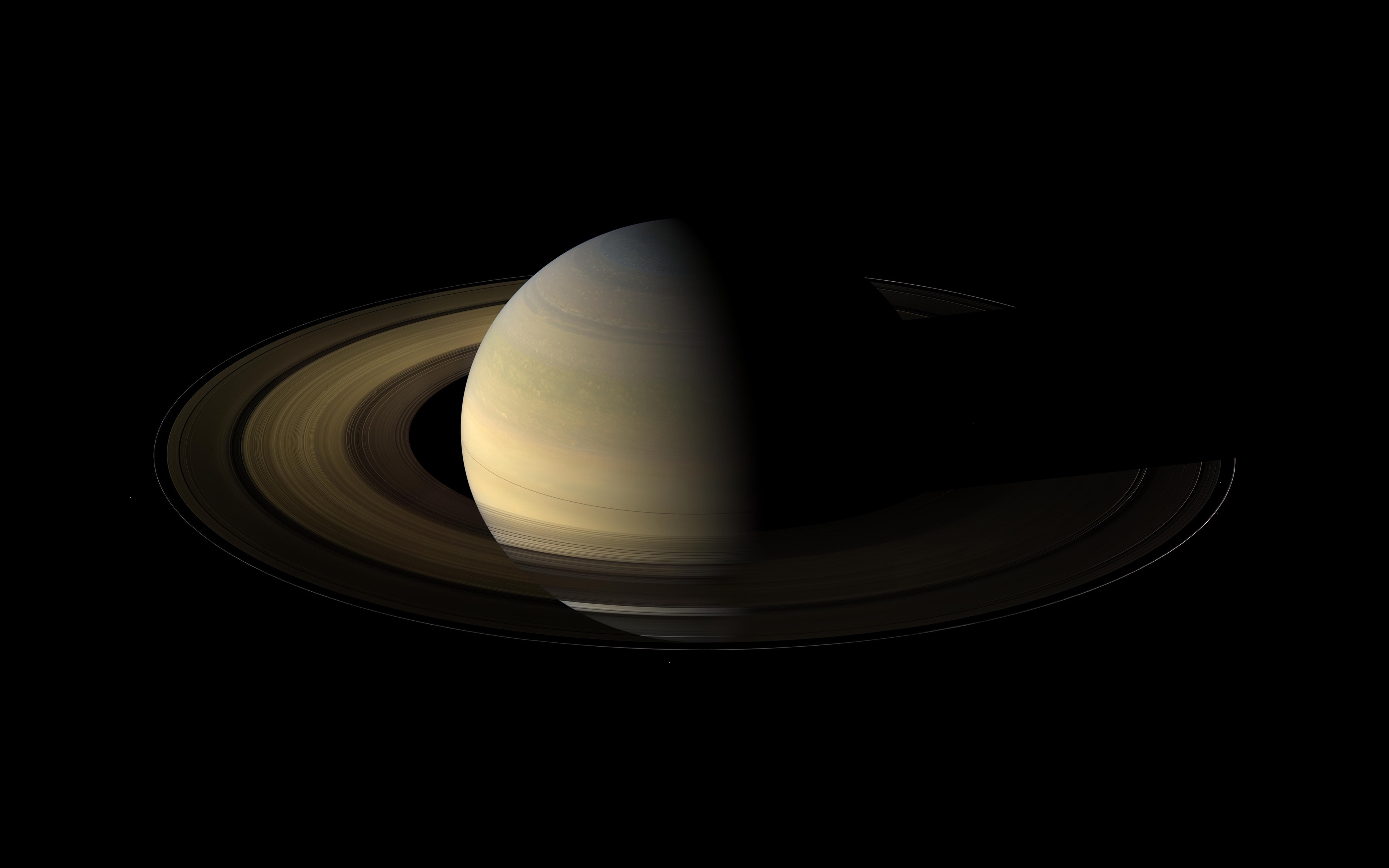 Saturn and its rings in space HD Wallpaper