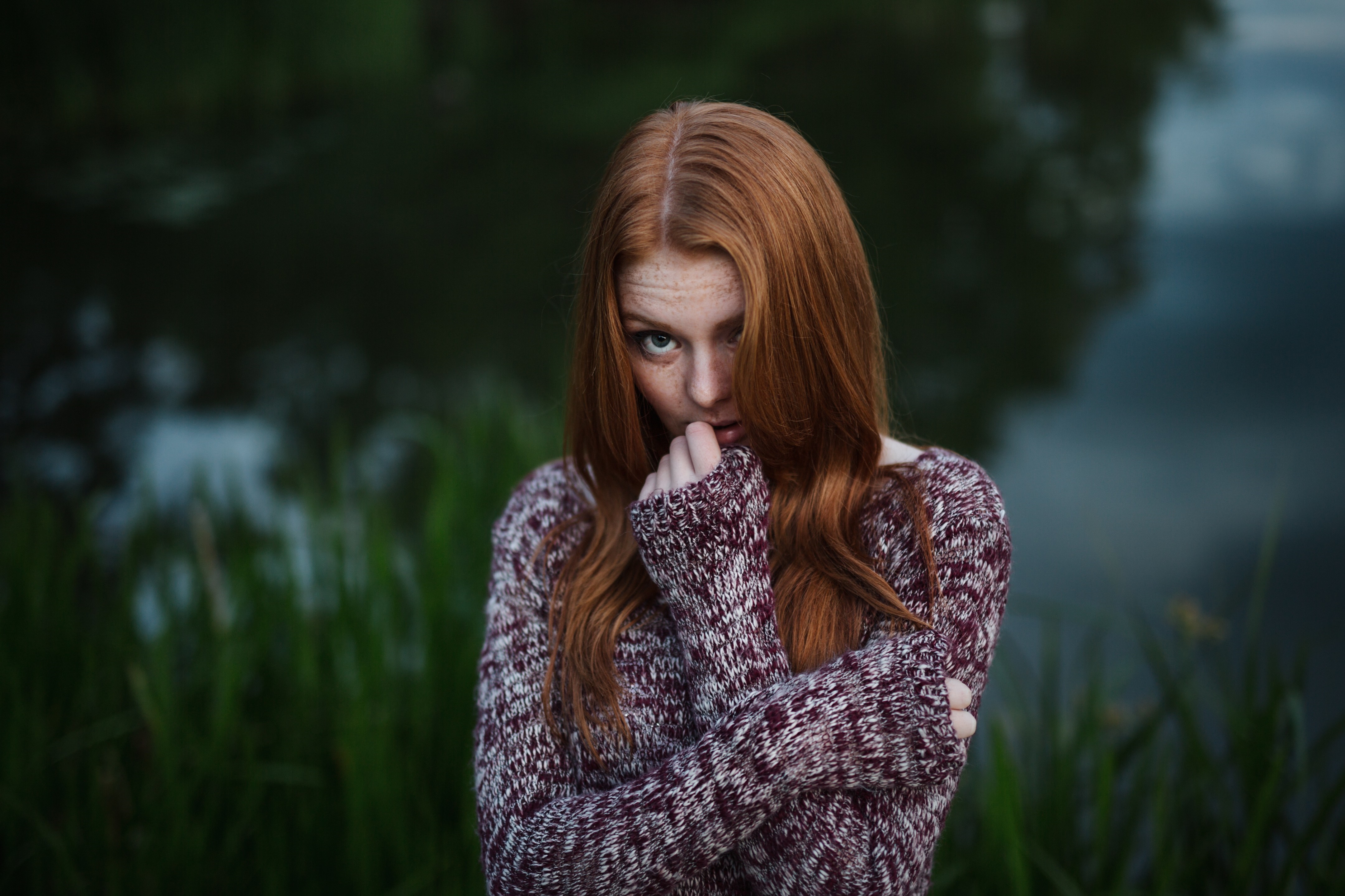 Redhead woman with freckles wearing a sweater outdoors HD Wallpaper