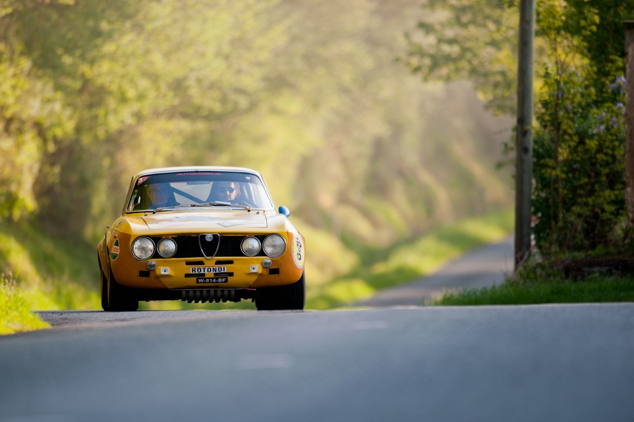Yellow Alfa Romeo GT Veloce rally car on a road HD Wallpaper
