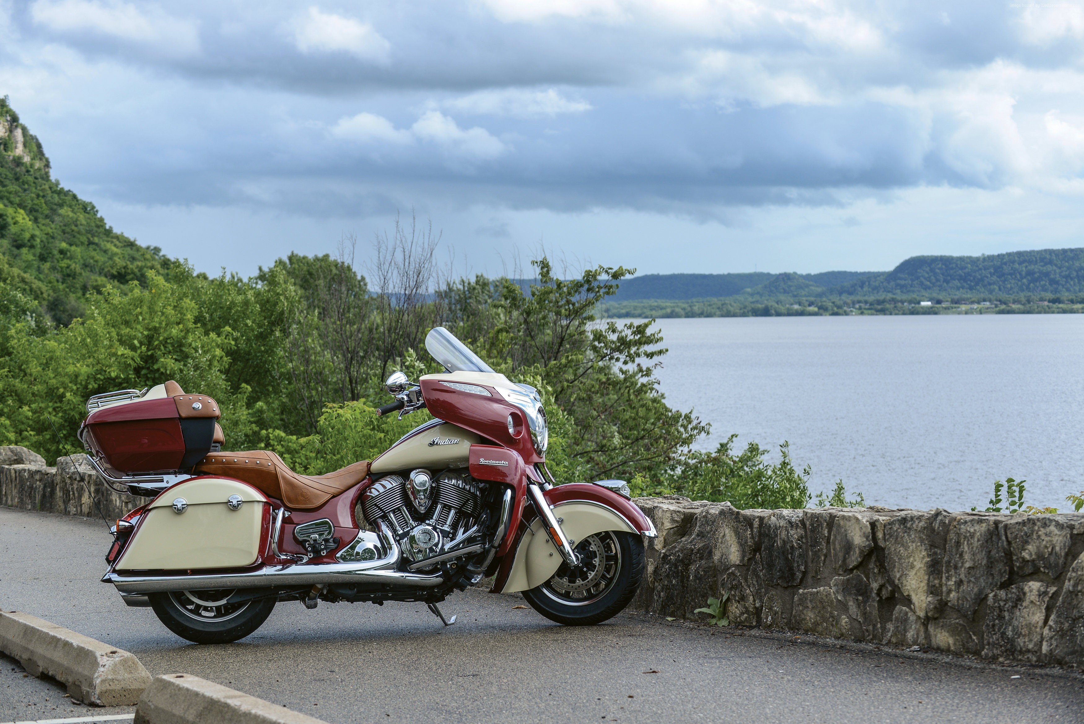 Red and cream Indian Roadmaster motorcycle by a lake HD Wallpaper