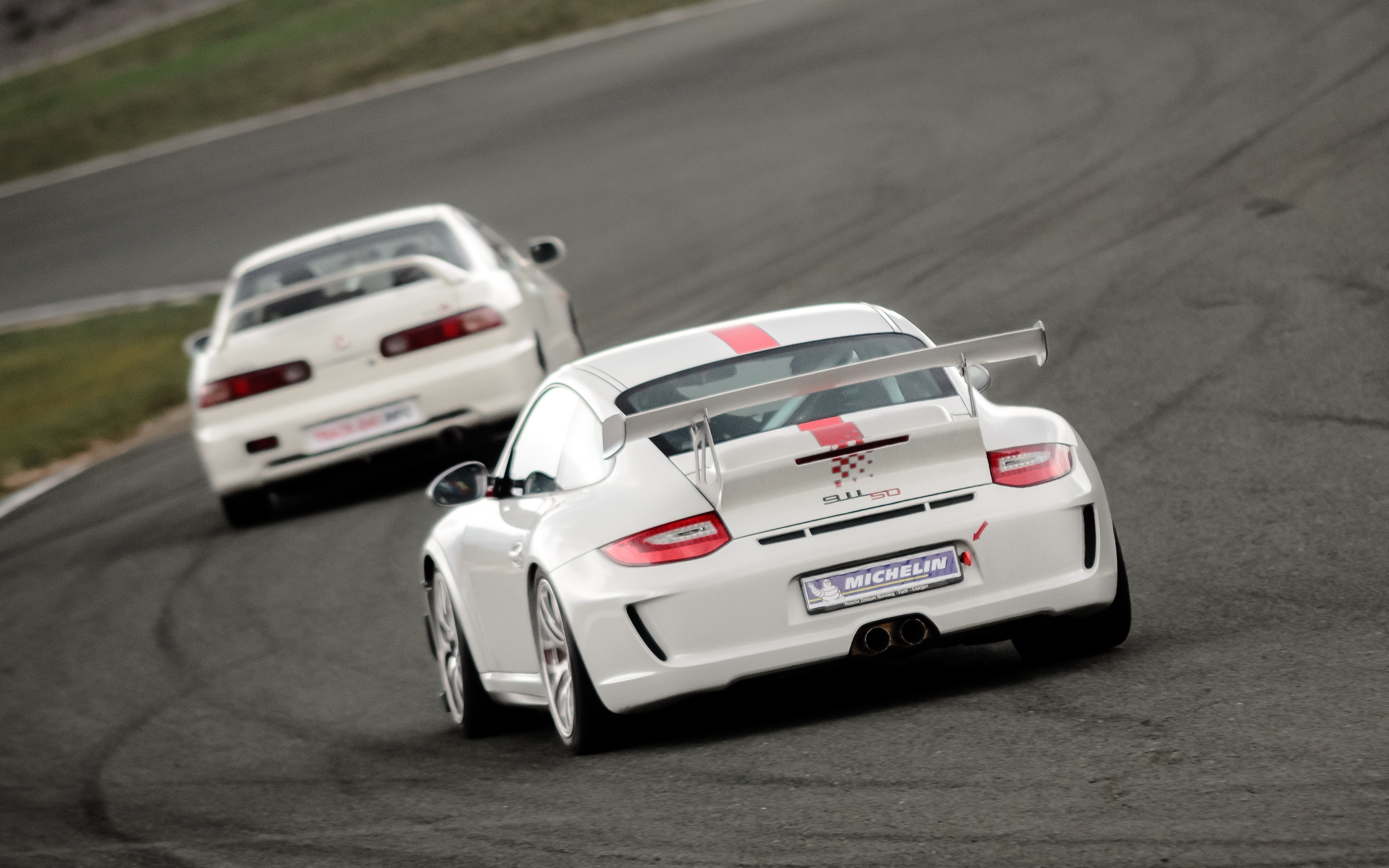 White Porsche 911 GT3 and Honda Integra on a Race Track HD Wallpaper