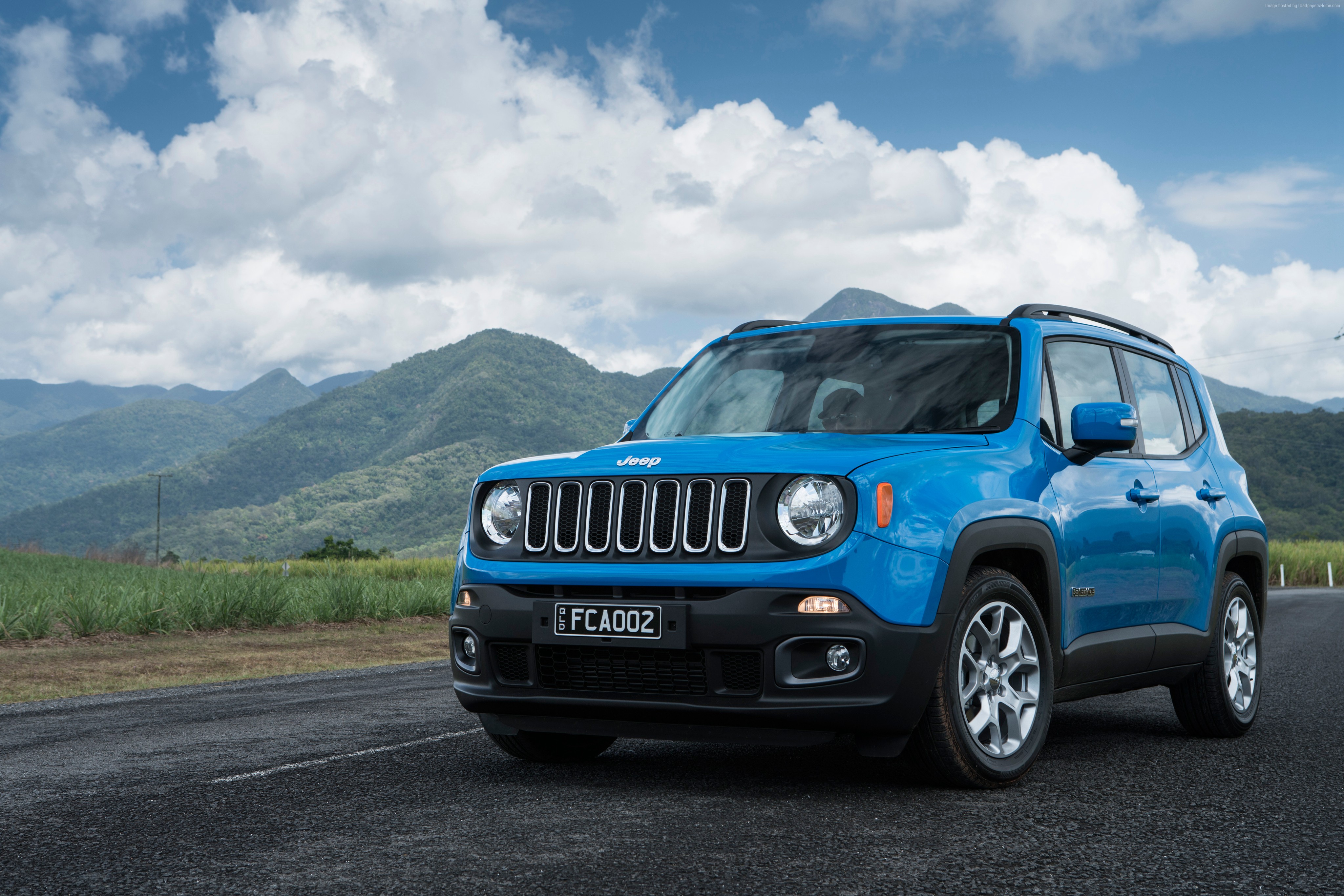 Blue Jeep Renegade Longitude SUV on a road HD Wallpaper
