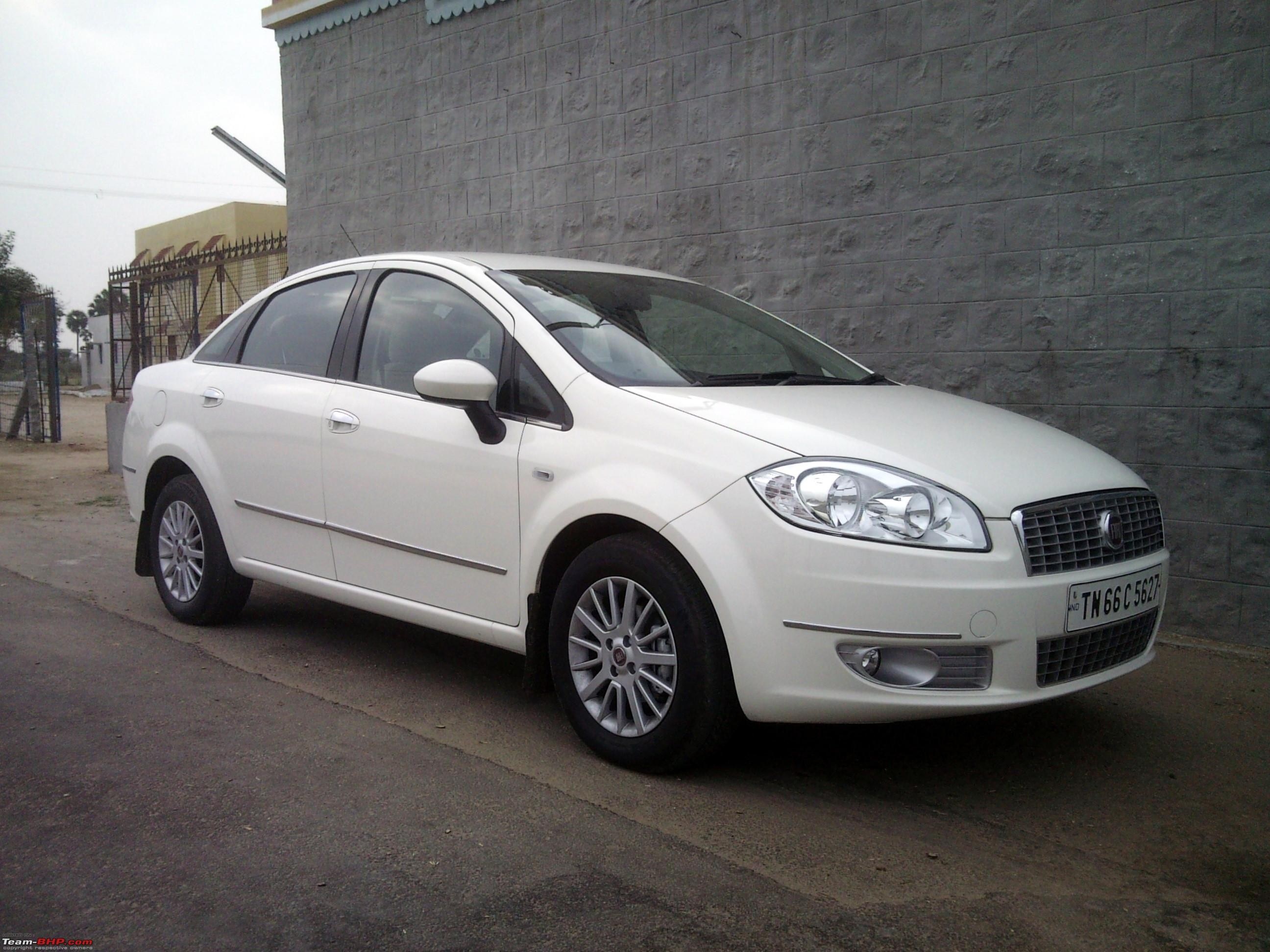 White Fiat Linea Sedan parked on a road HD Wallpaper