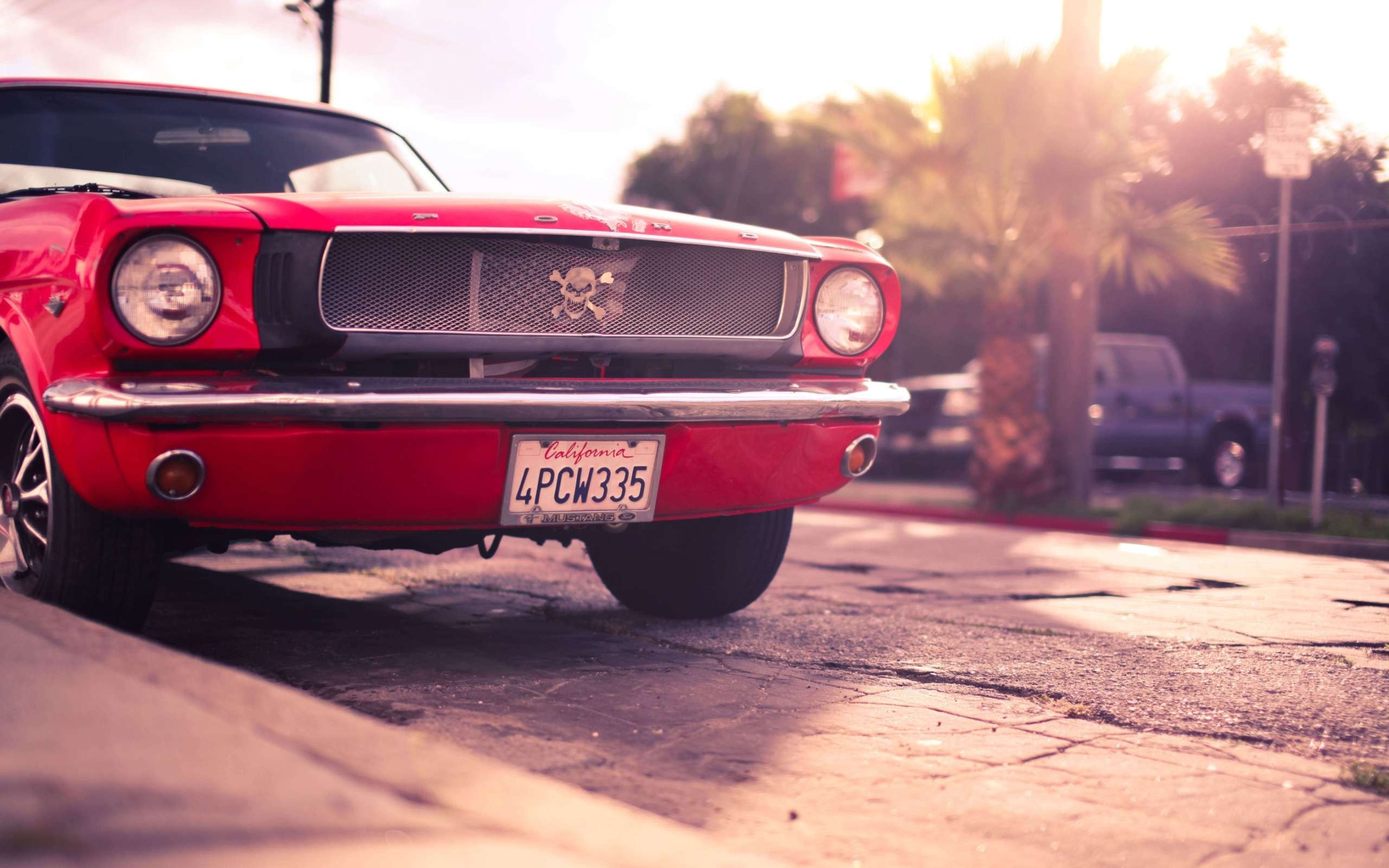 Red Ford Mustang with Skull Grille Emblem HD Wallpaper
