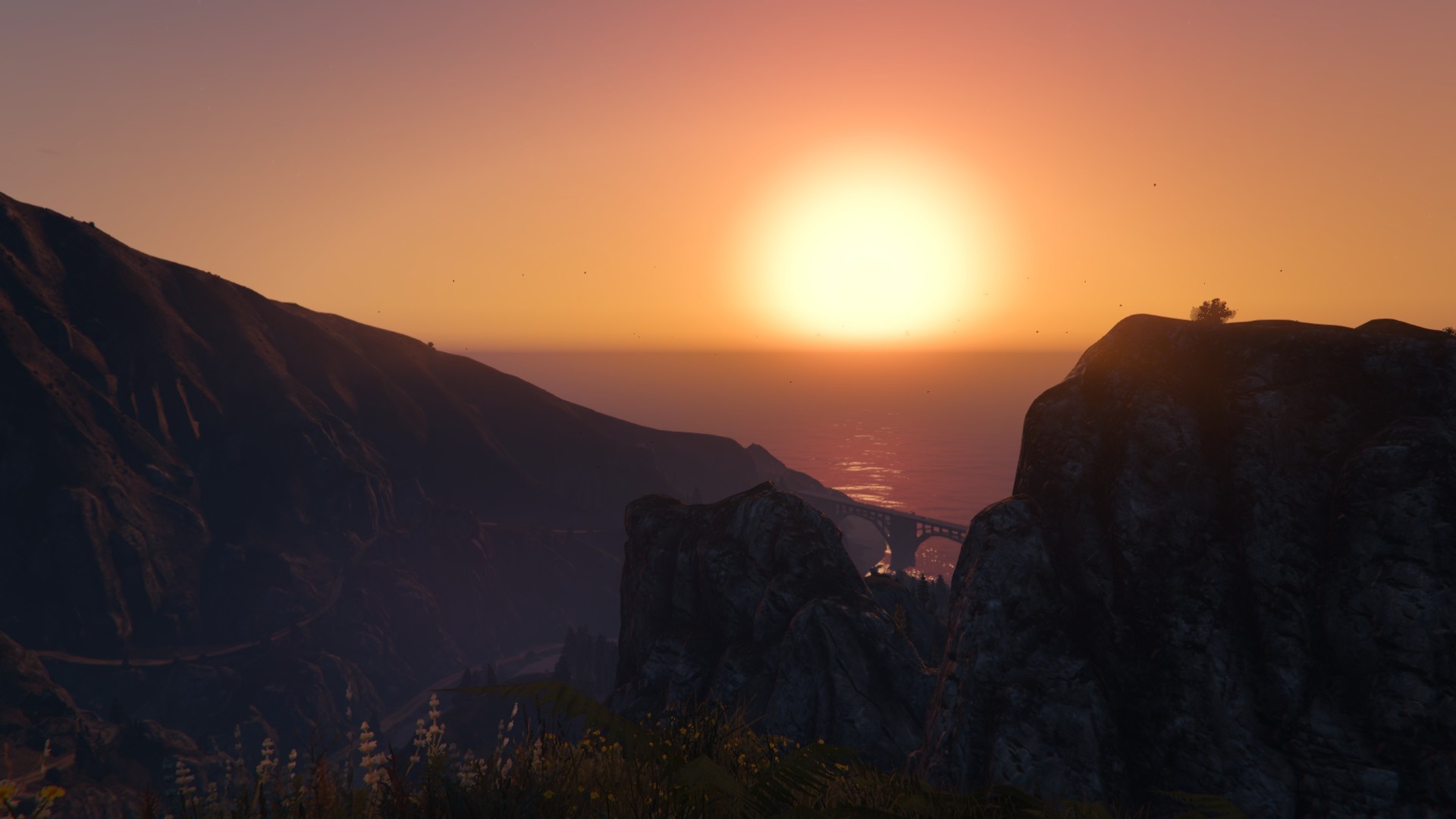 Sunset over mountains and ocean in Grand Theft Auto V HD Wallpaper