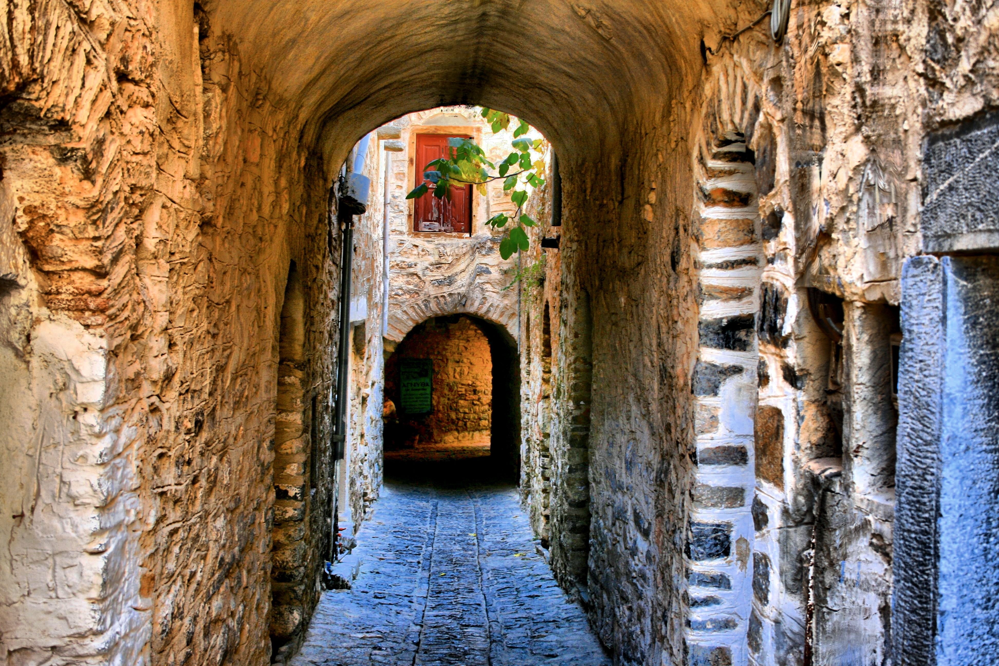 Ancient Stone Alleyway with Arch in Chios, Greece HD Wallpaper