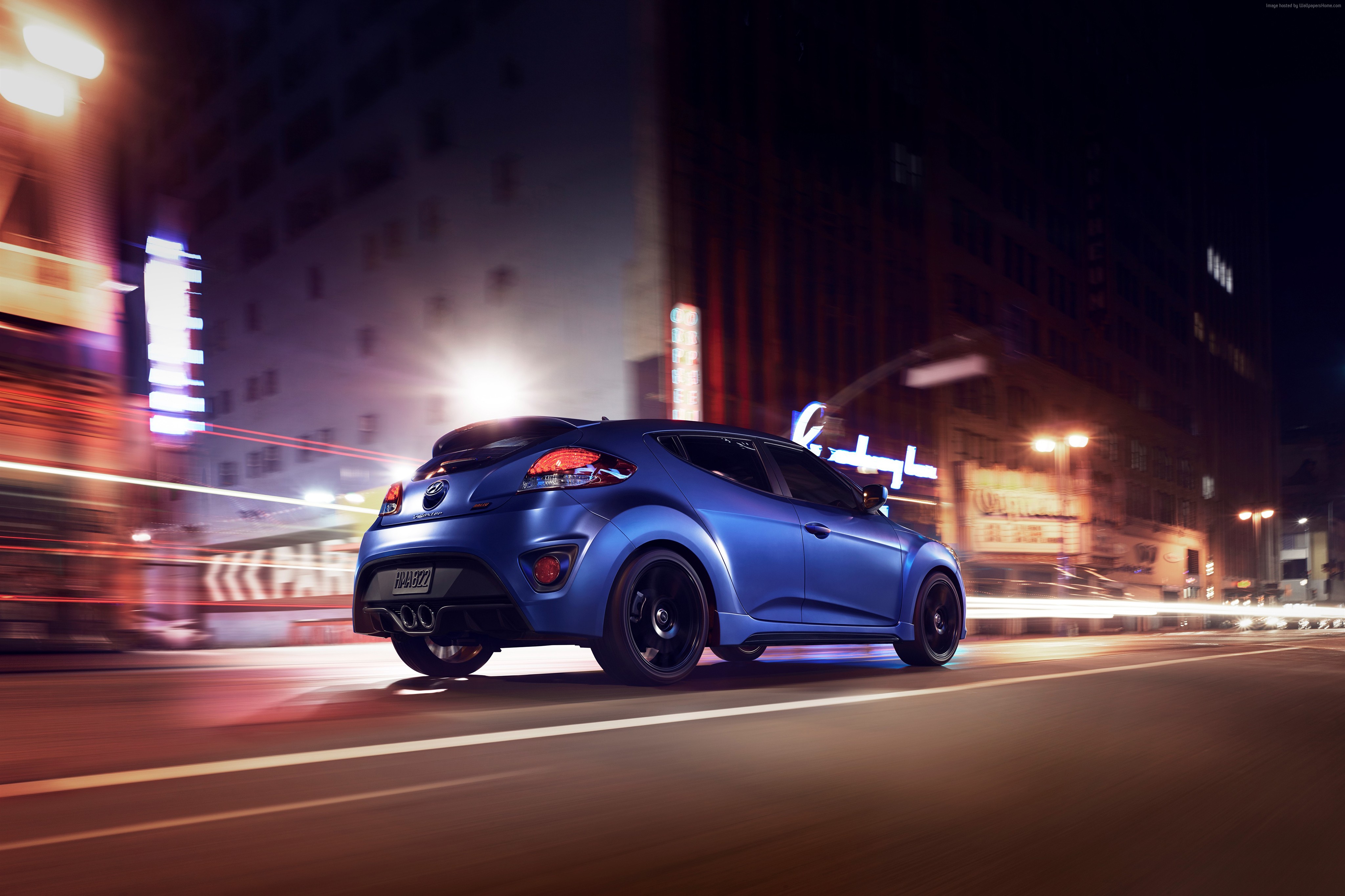 Blue Hyundai Veloster Rally Edition driving at night HD Wallpaper