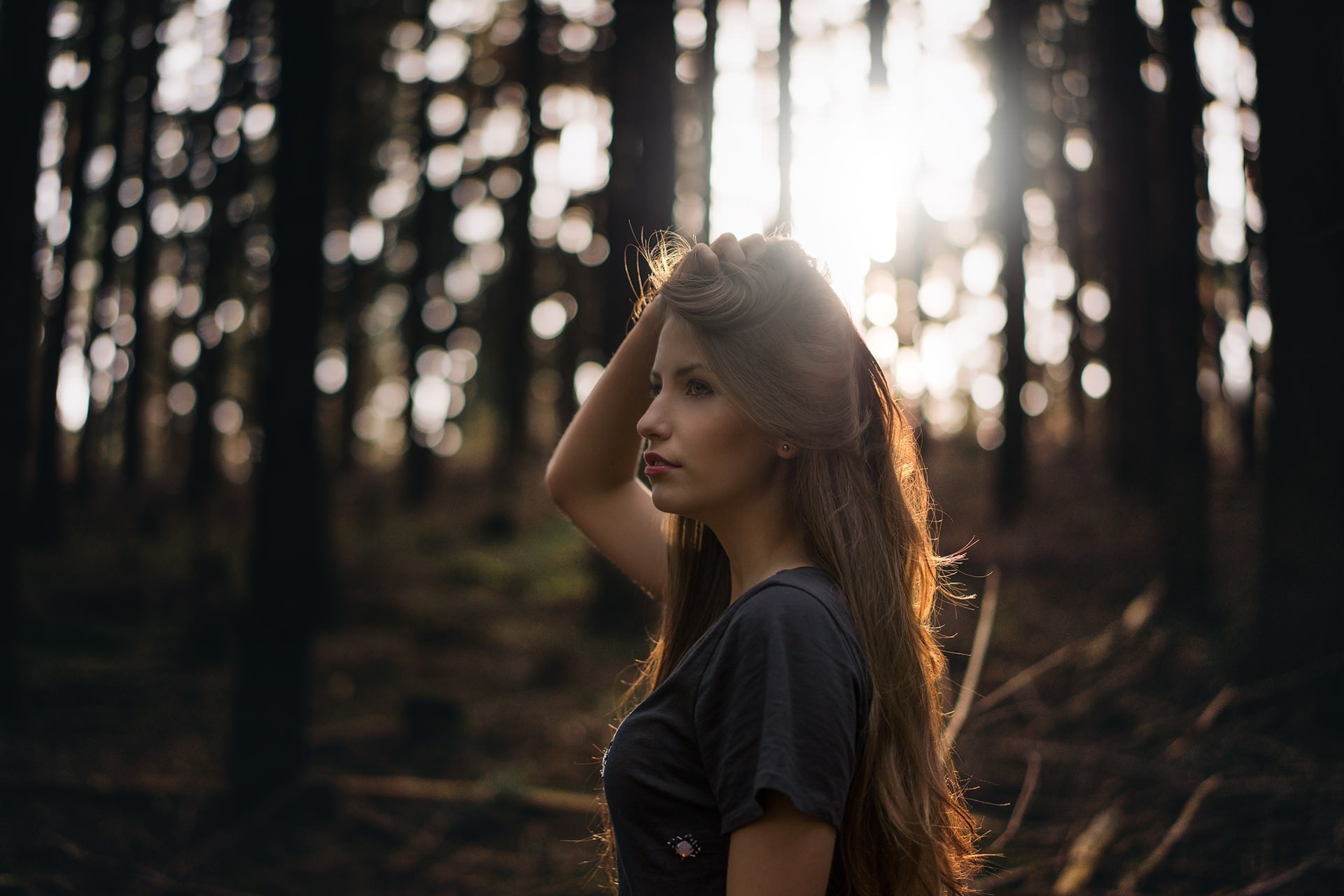 Woman in forest with sunlight HD Wallpaper