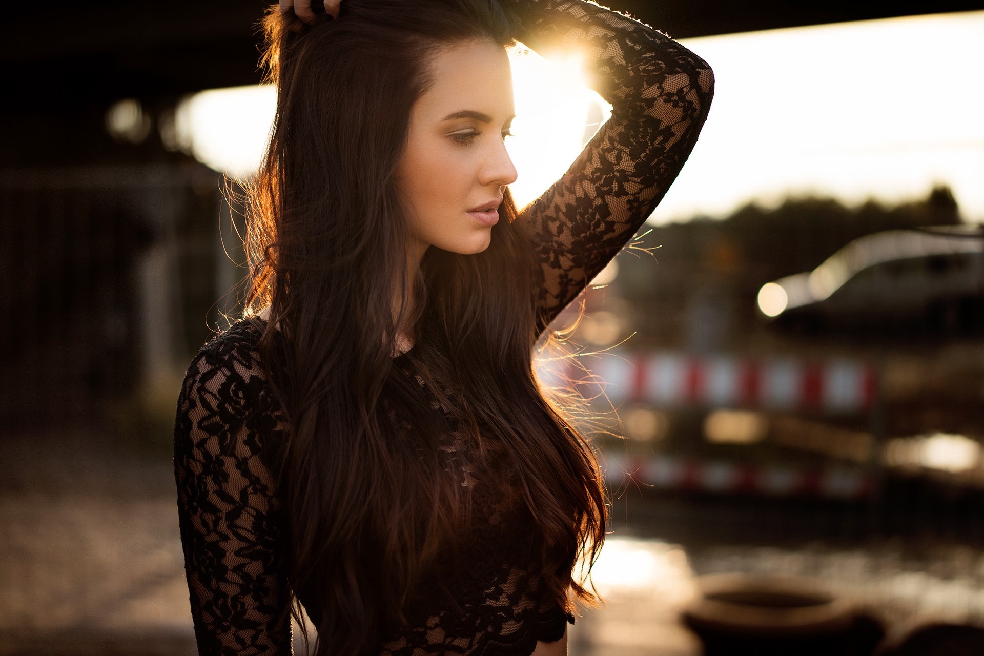 Woman in black lace dress with hand in hair HD Wallpaper