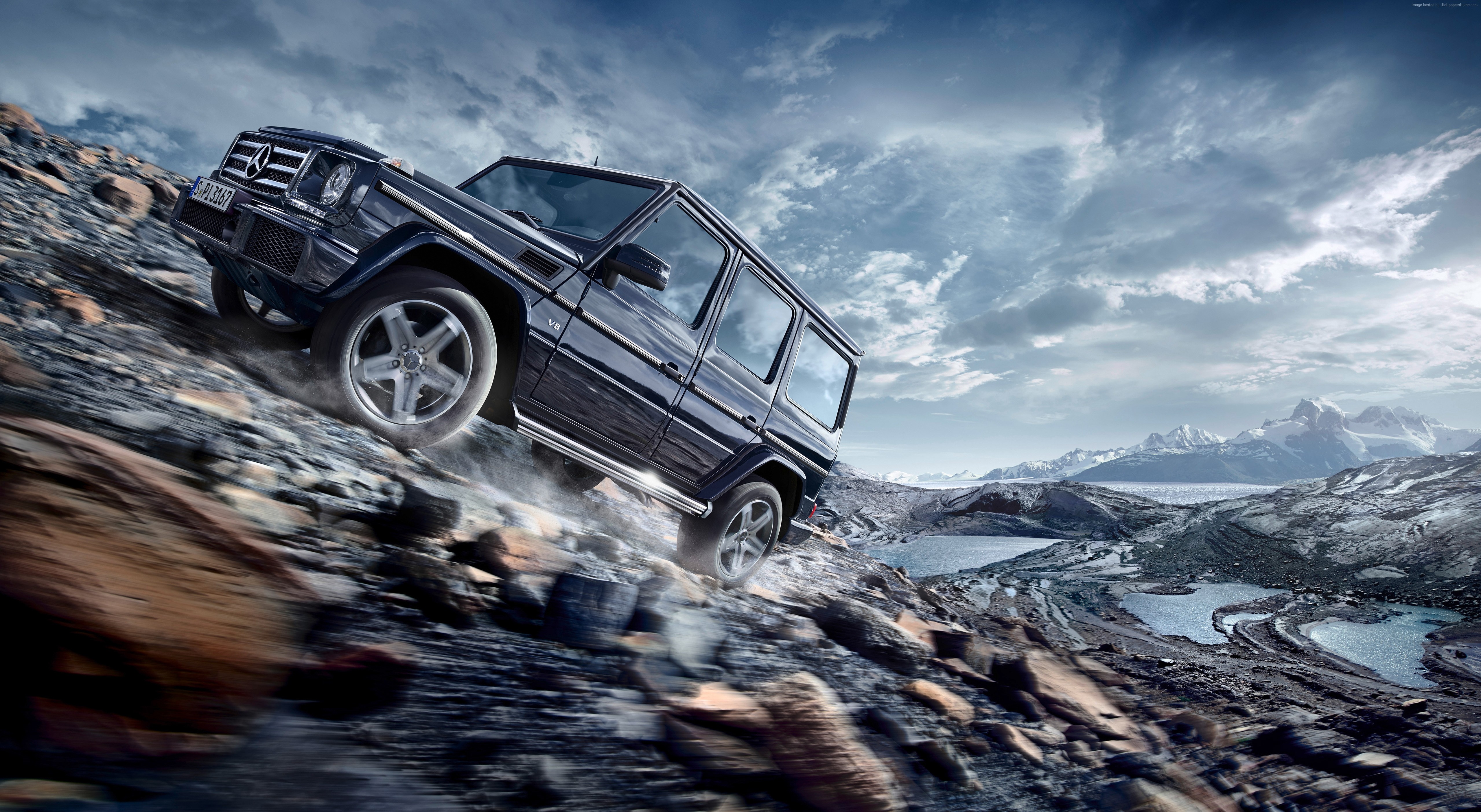 Mercedes-Benz G-Class off-roading on rocky terrain HD Wallpaper