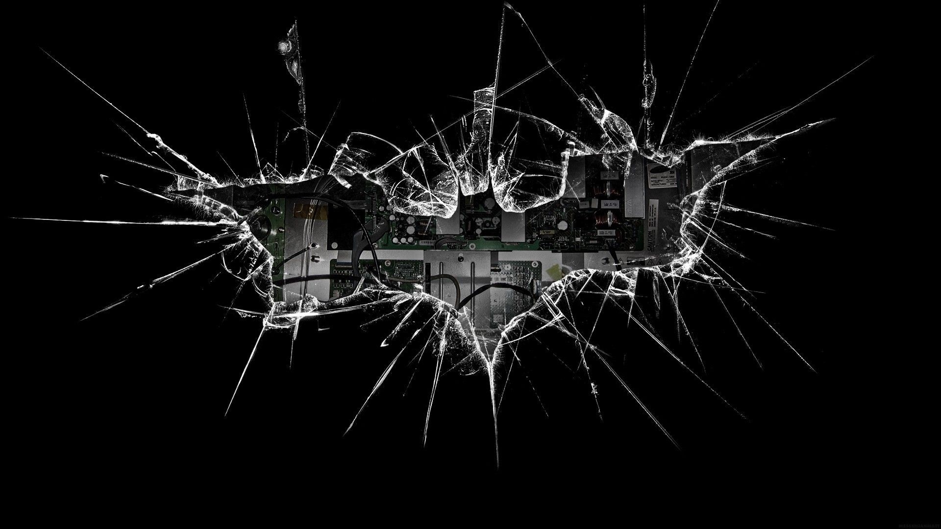 Broken screen with Batman logo and circuit board HD Wallpaper