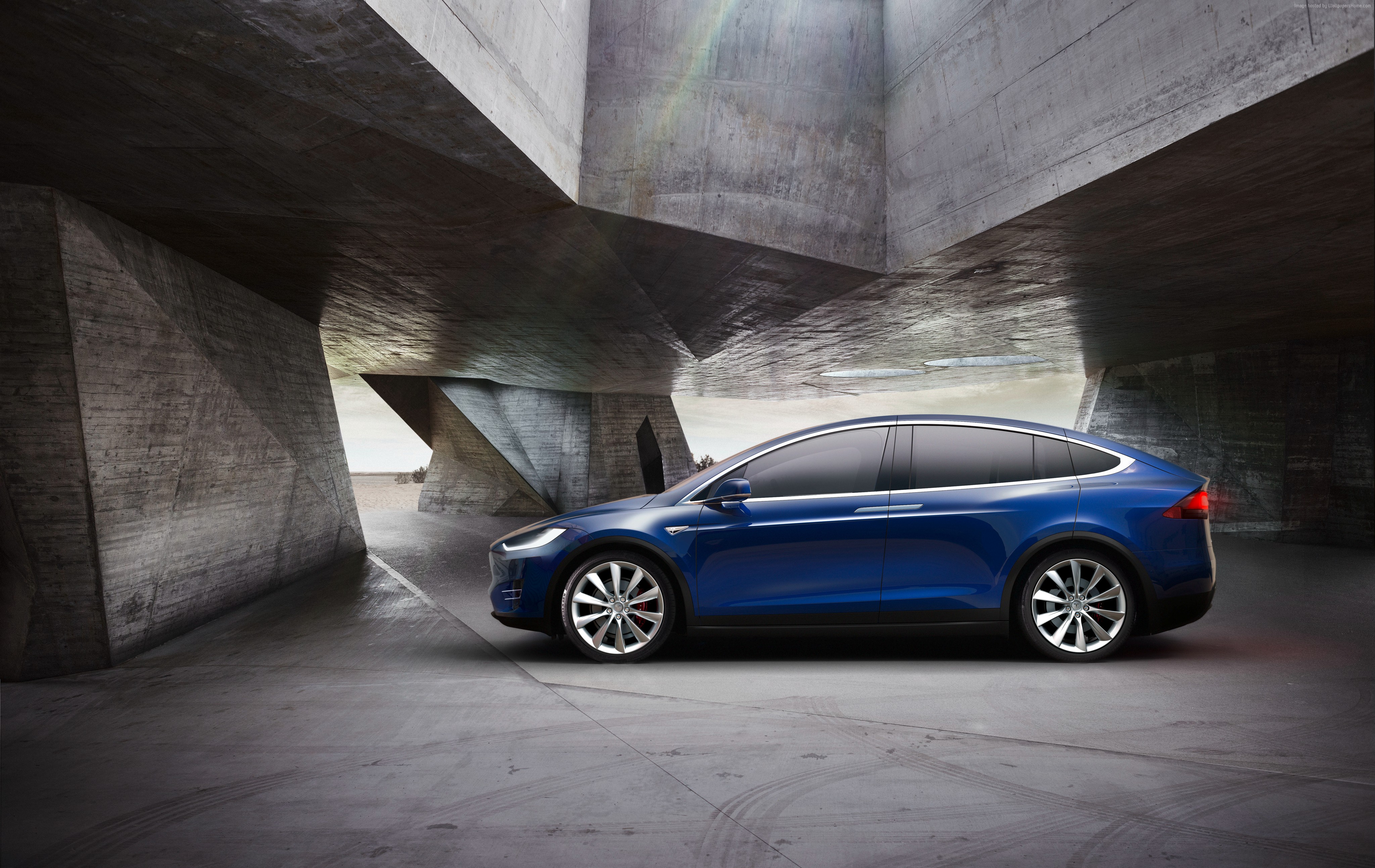 Blue Tesla Model X P90D parked in concrete structure HD Wallpaper