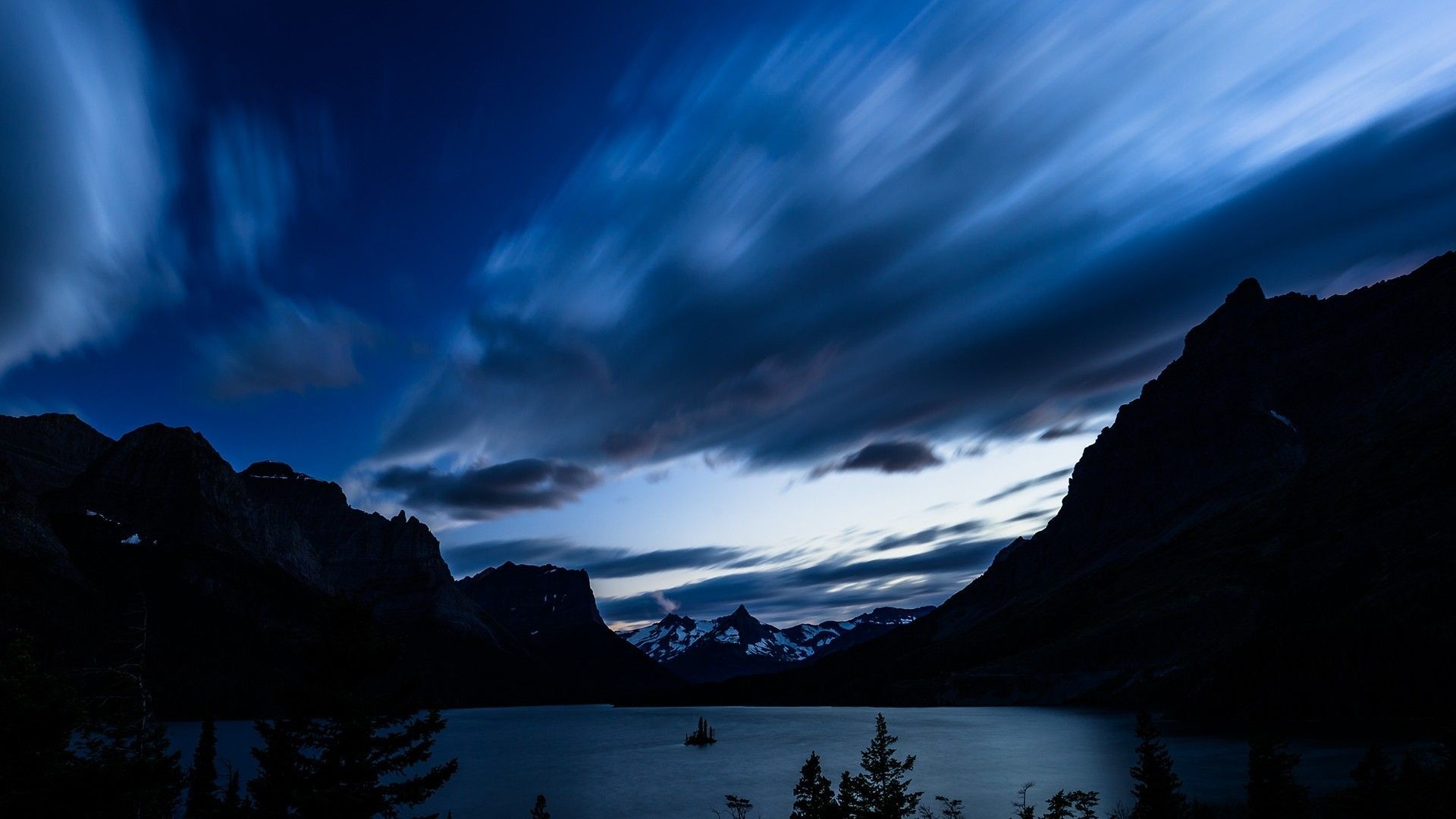 Mountains and lake at dusk with streaking clouds HD Wallpaper