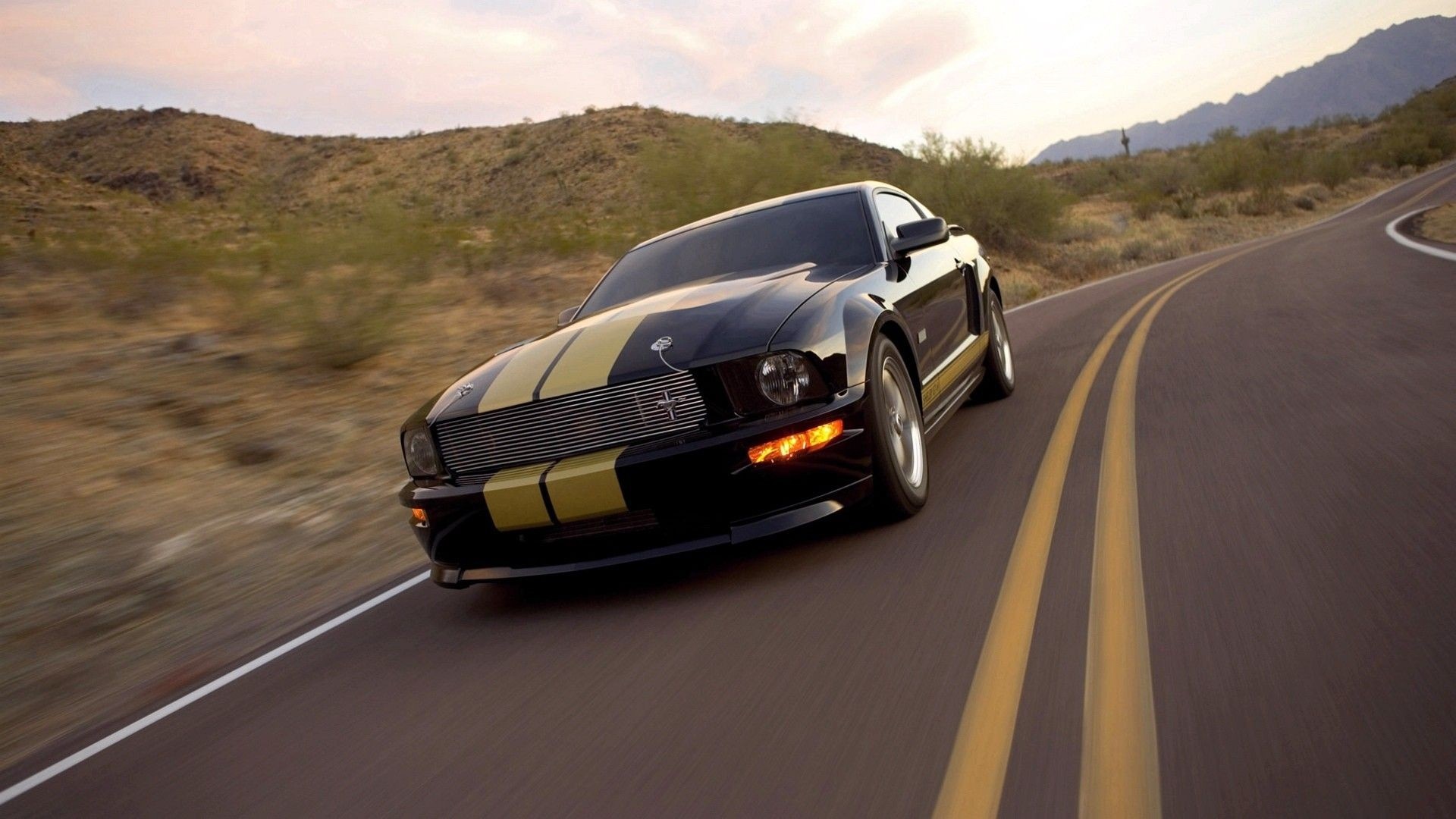 Black Ford Mustang GT with Gold Stripes on Desert Road HD Wallpaper