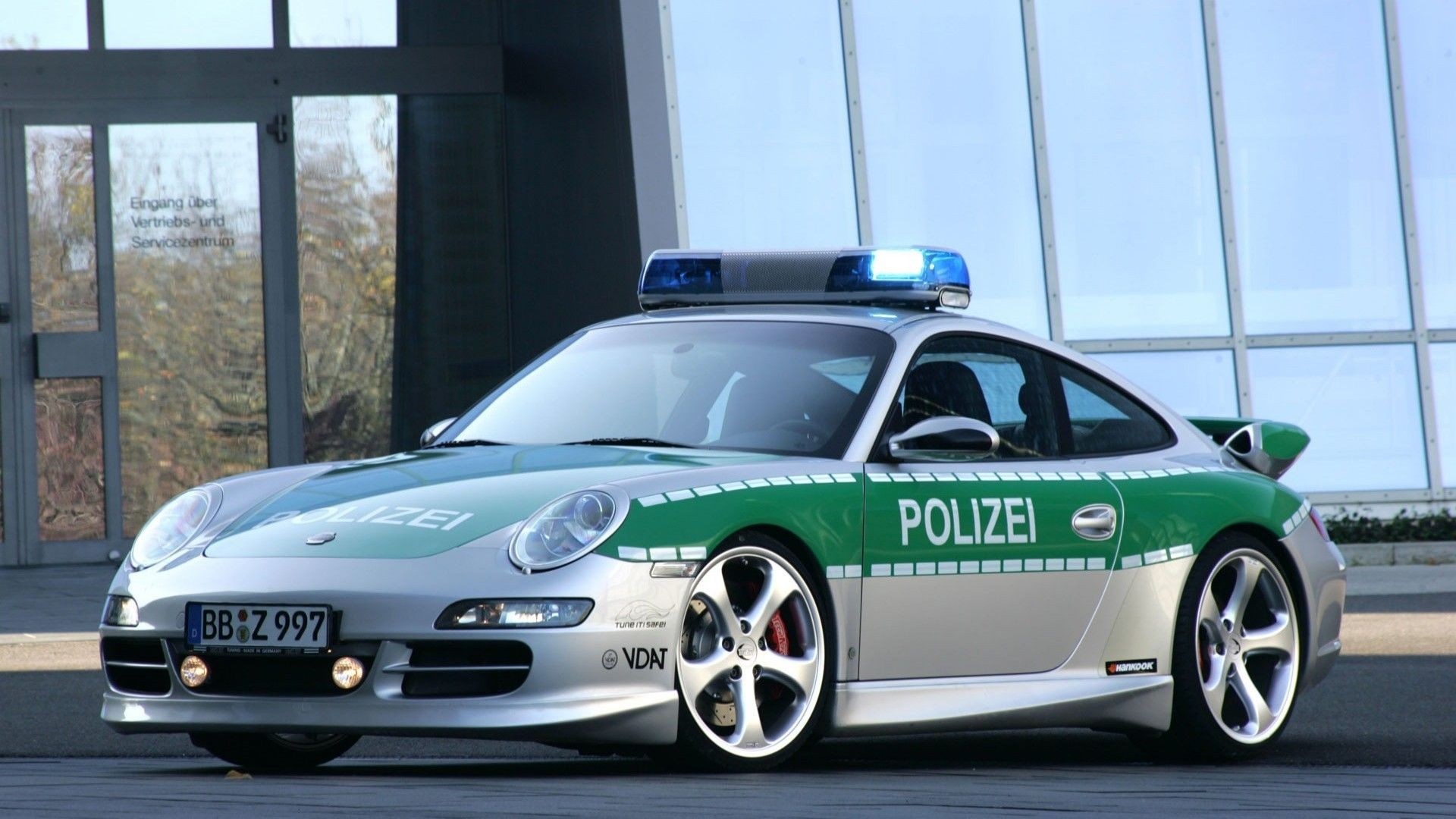 Porsche police car with blue lights HD Wallpaper