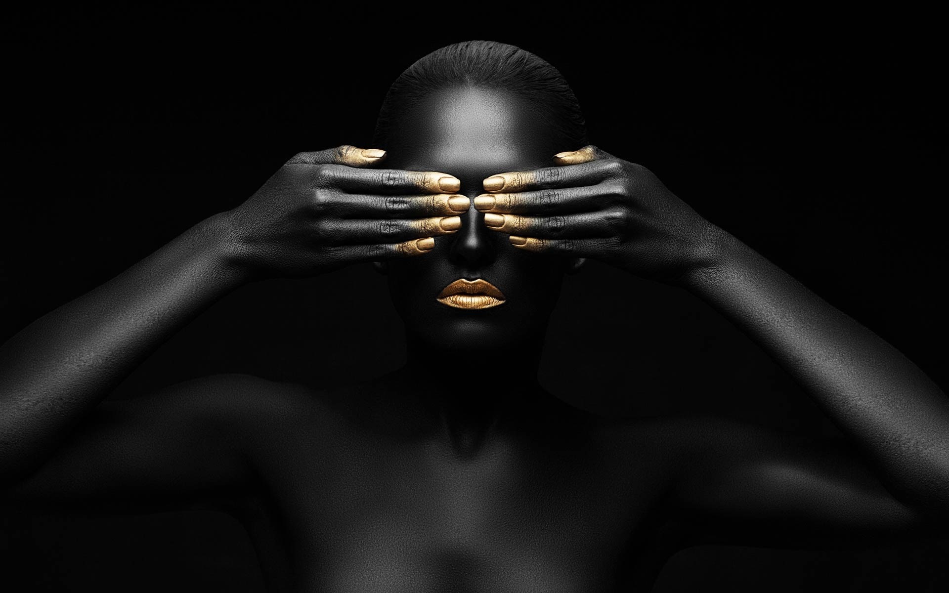 Woman with black skin and gold accents covering eyes HD Wallpaper