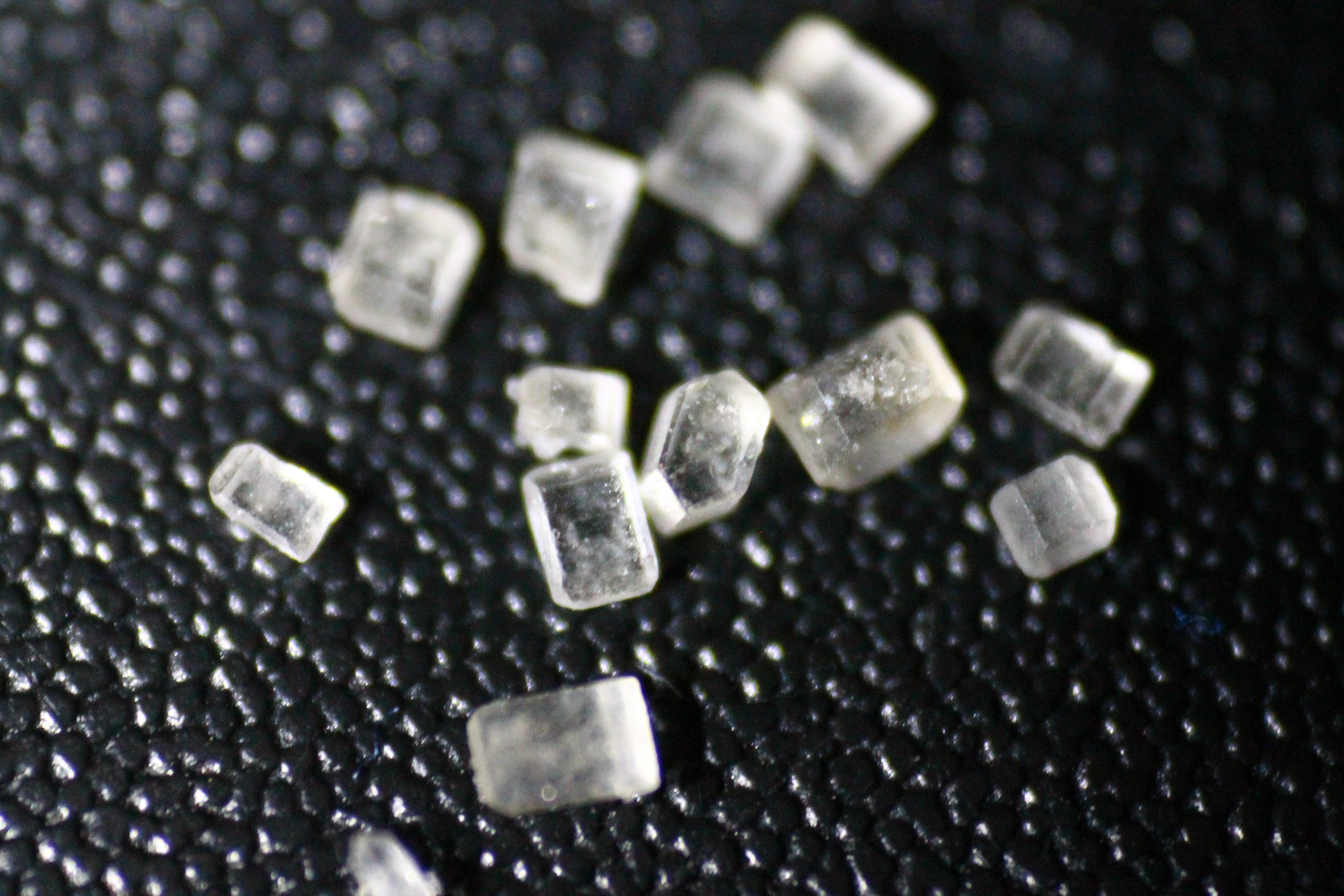 Close up of sugar crystals on a textured surface HD Wallpaper