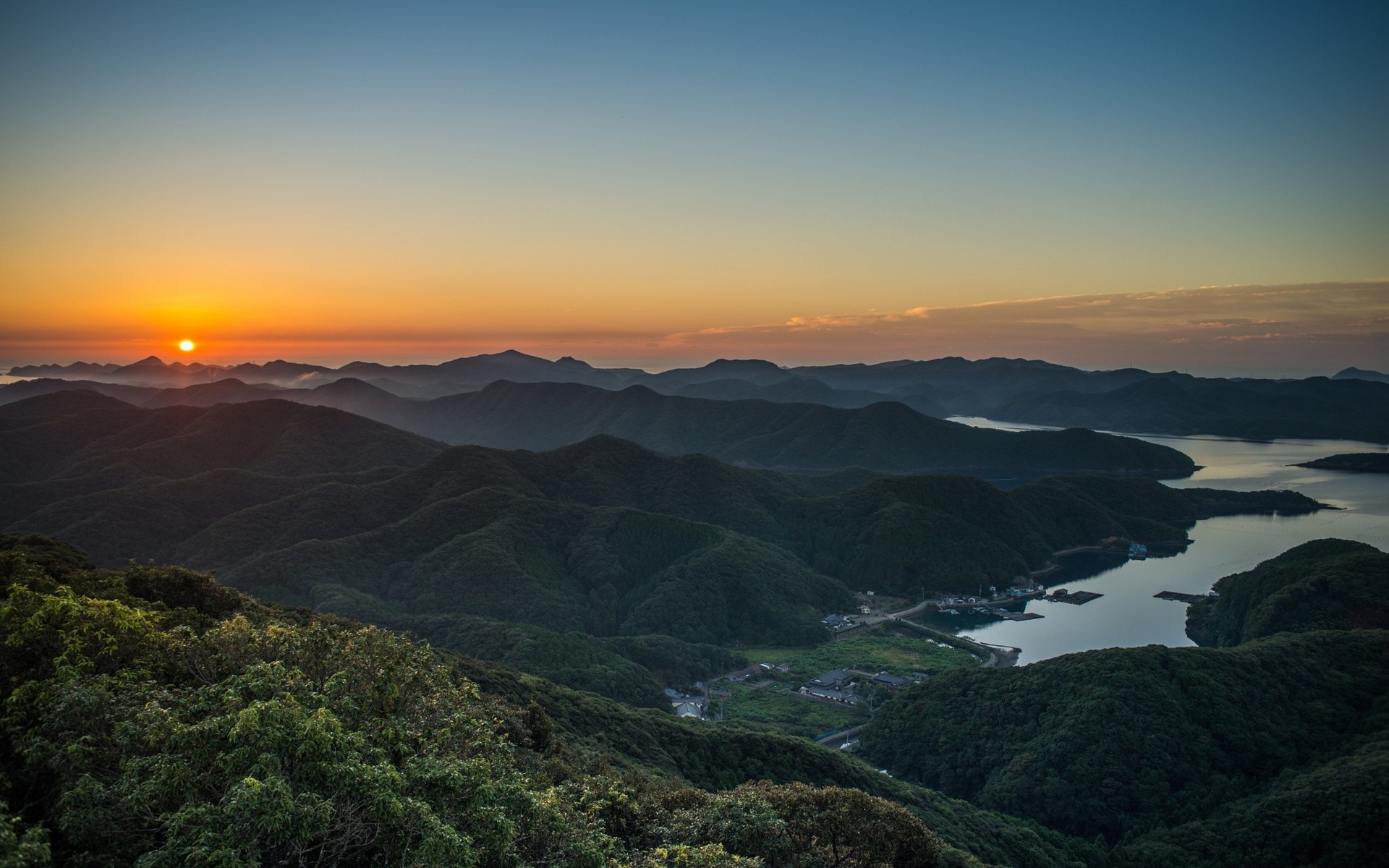 Sunrise over mountains and sea with villages HD Wallpaper